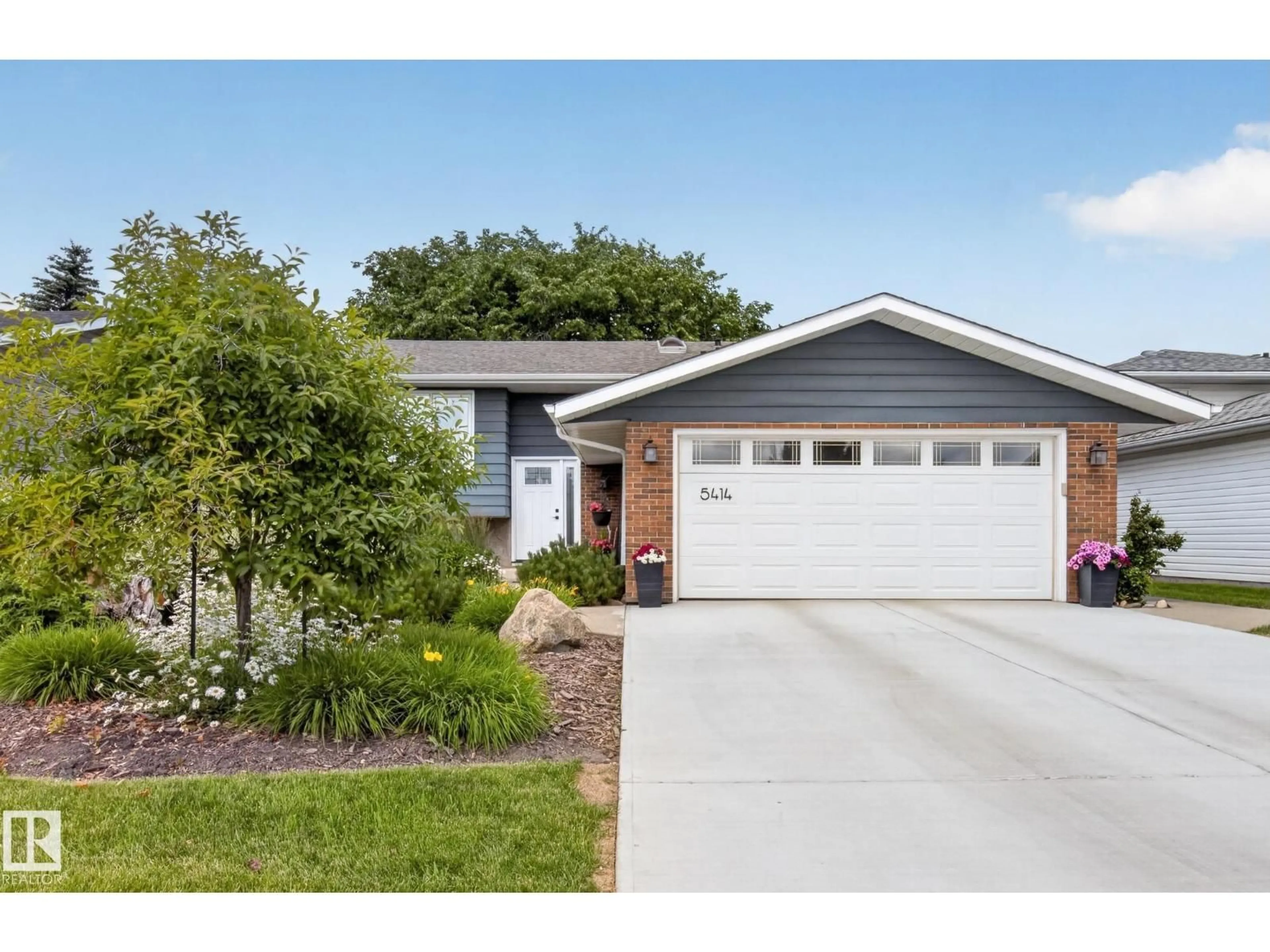 Home with vinyl exterior material, street for 5414 17A AV, Edmonton Alberta T6L1L2