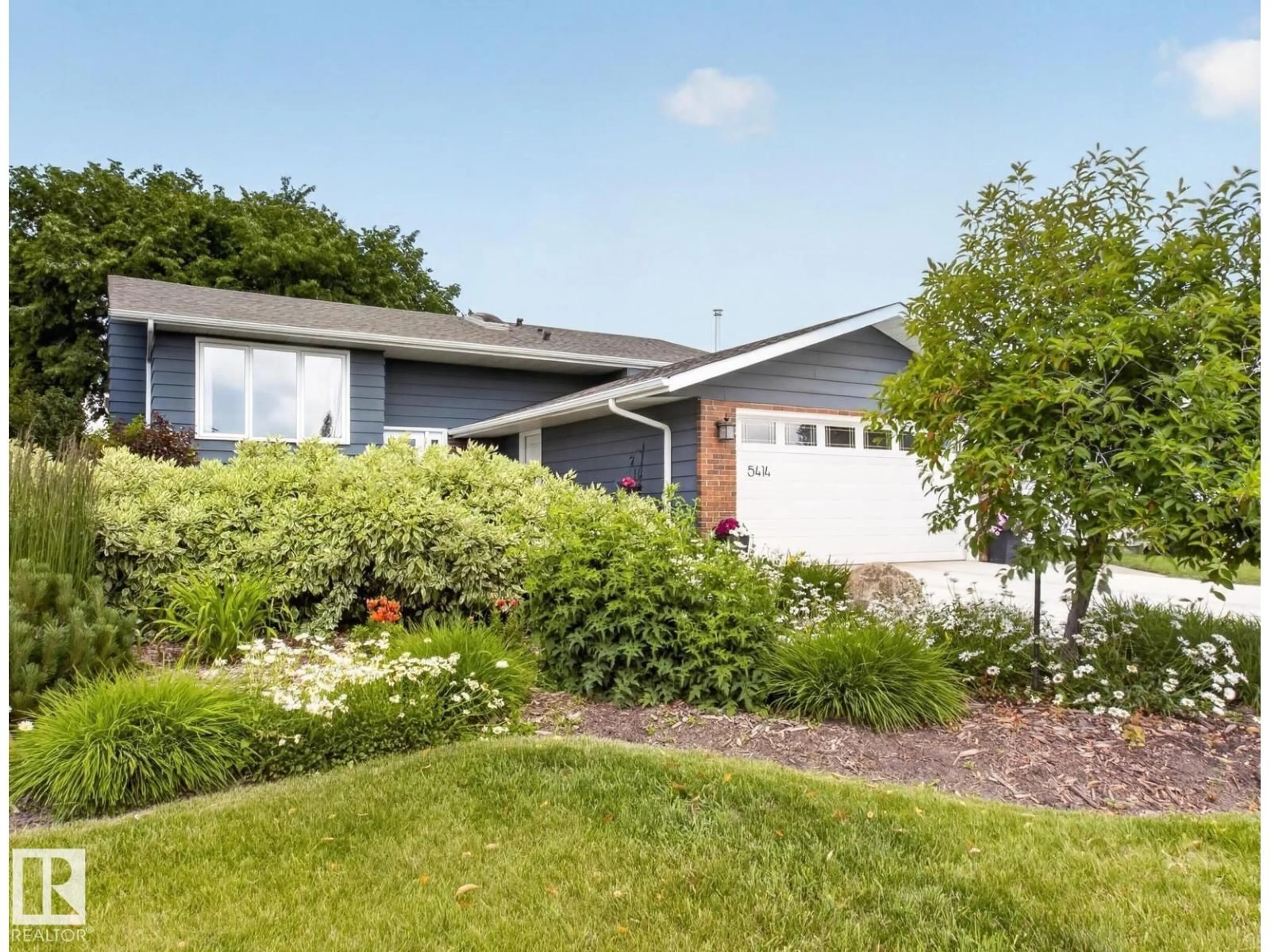 Home with vinyl exterior material, street for 5414 17A AV, Edmonton Alberta T6L1L2