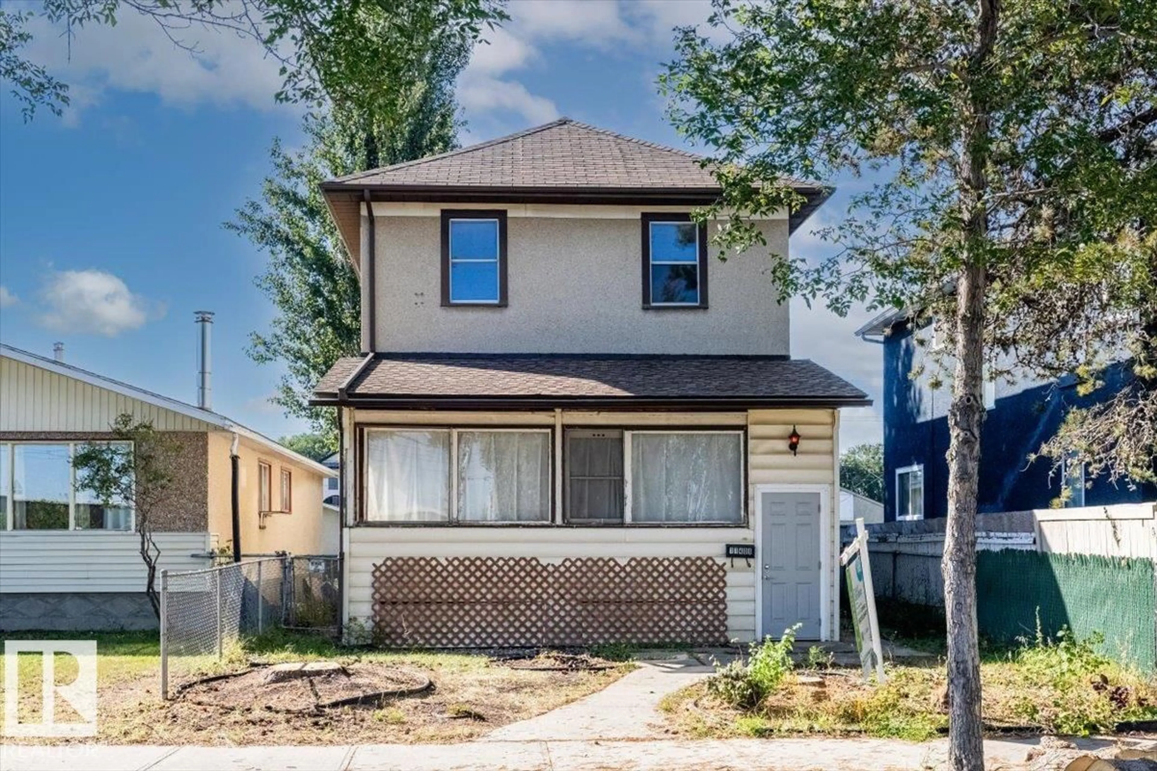 Home with vinyl exterior material, street for 11408 81 ST, Edmonton Alberta T5B2R6