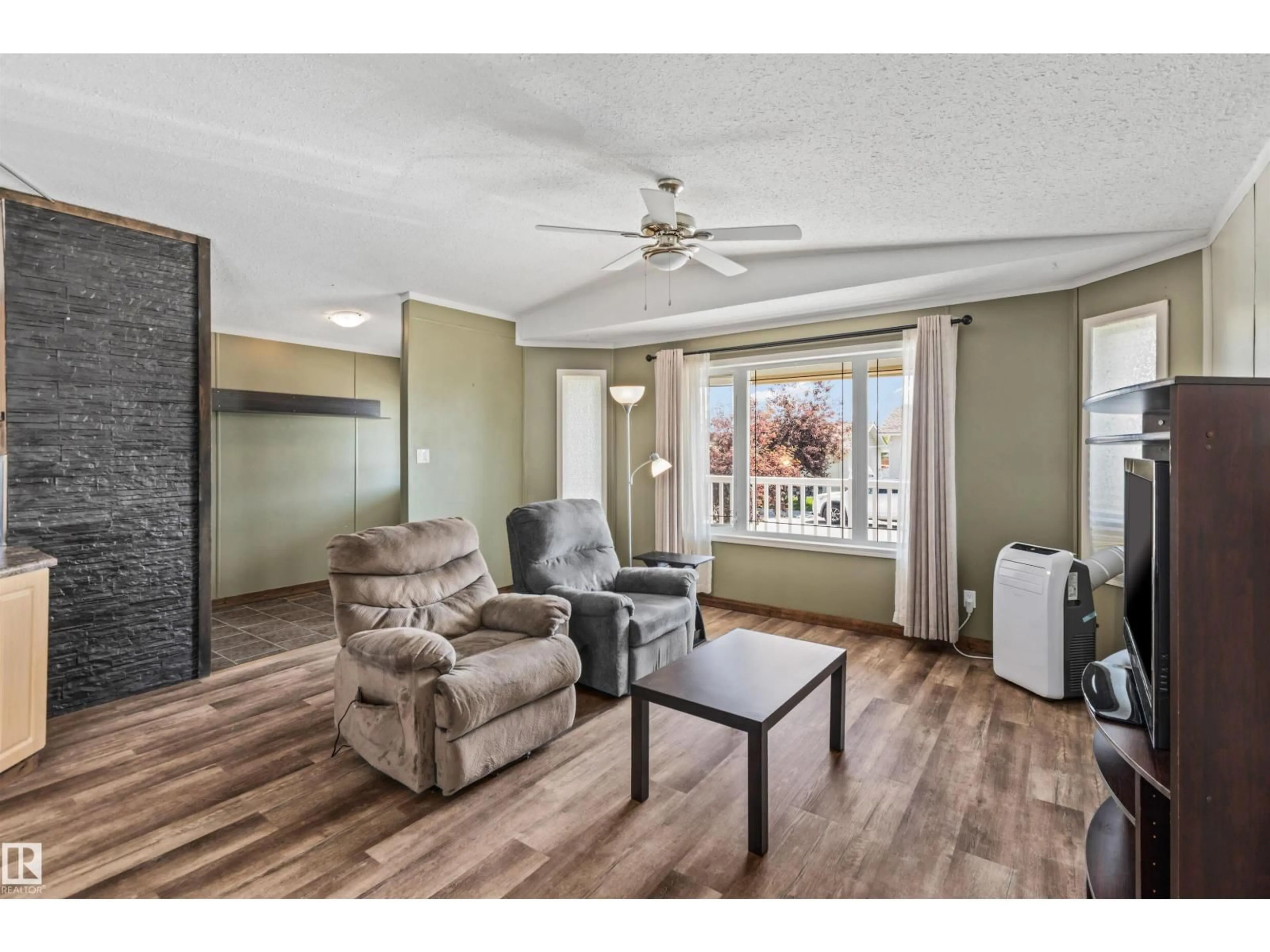 Living room with furniture, unknown for 1172 ASPEN DR, Leduc Alberta T9E8R2