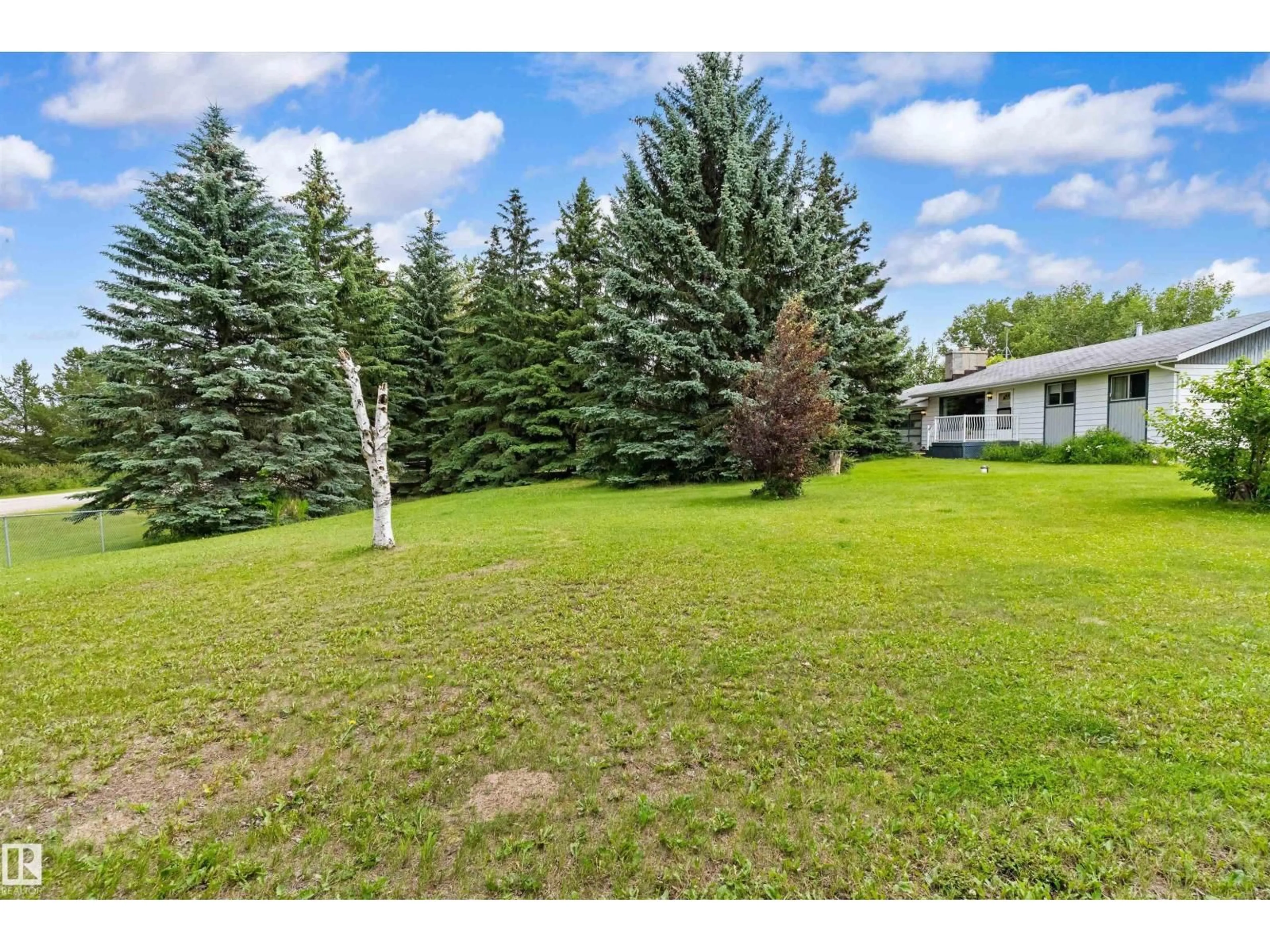 A pic from outside/outdoor area/front of a property/back of a property/a pic from drone, forest/trees view for #3 - 52432 RGE ROAD 20, Rural Parkland County Alberta T7Y2G7