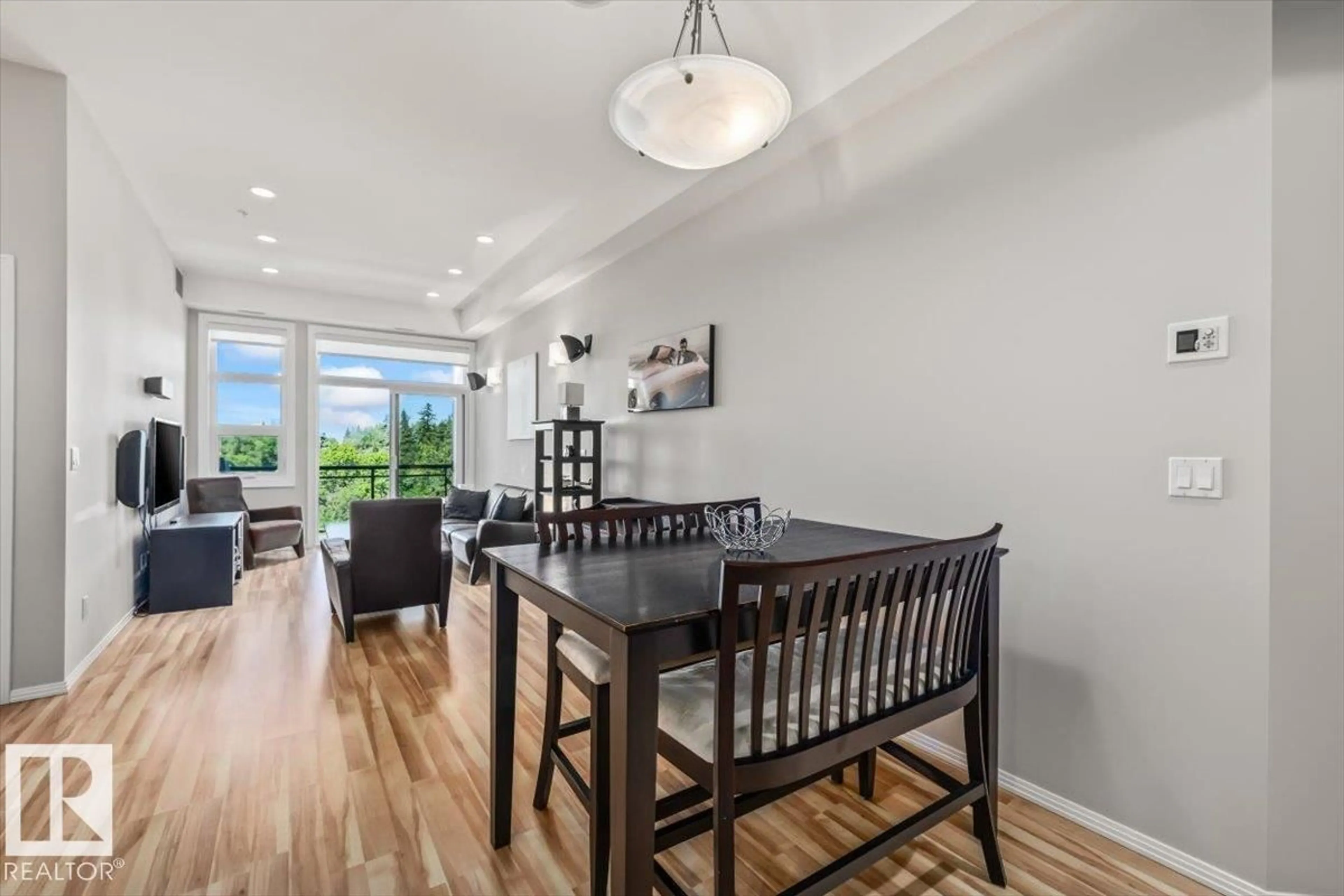 Dining room, wood/laminate floor for #427 - 10531 117 ST, Edmonton Alberta T5H0A8