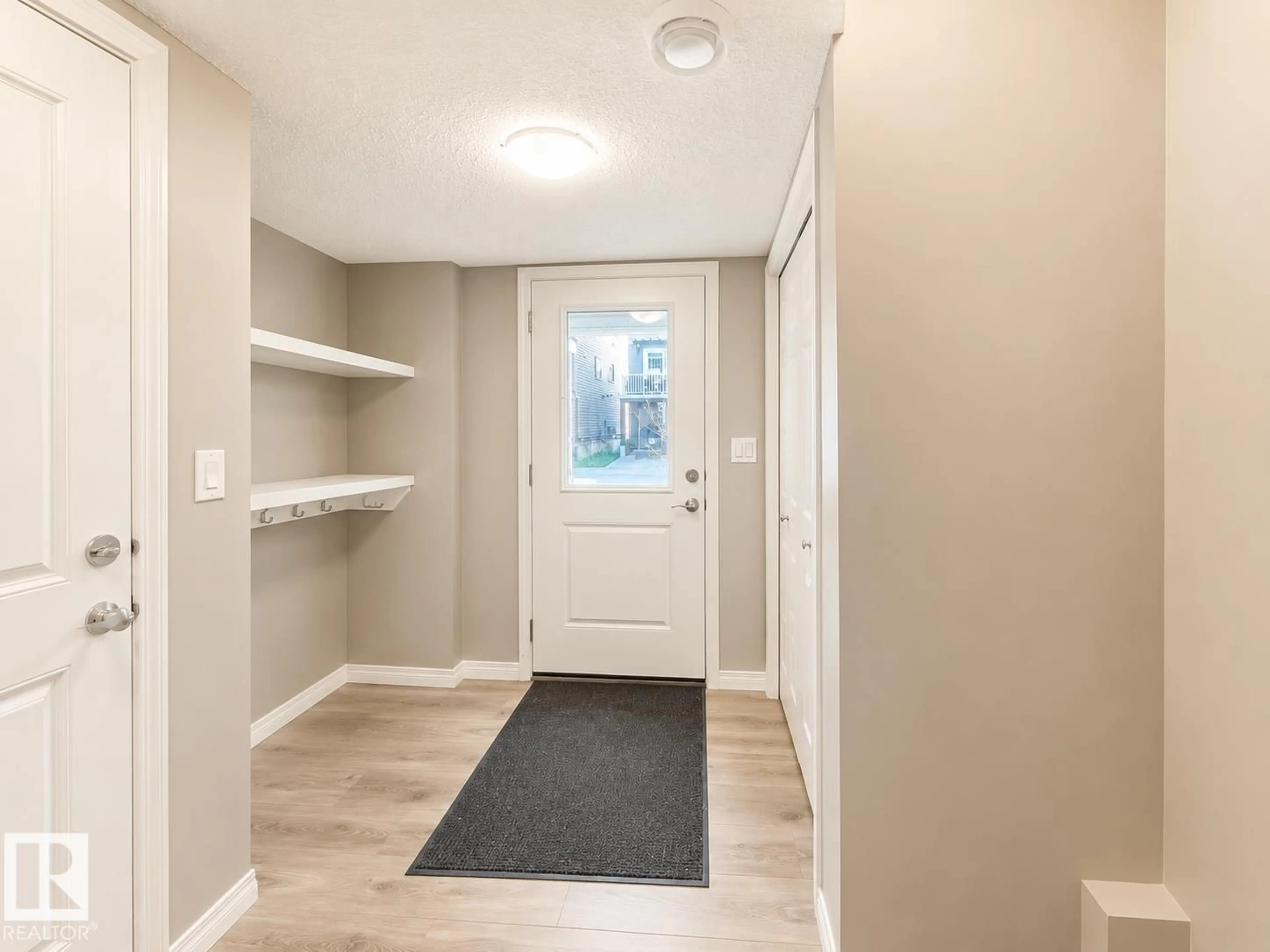 Indoor entryway for 20104 19 AV, Edmonton Alberta T6M0X9