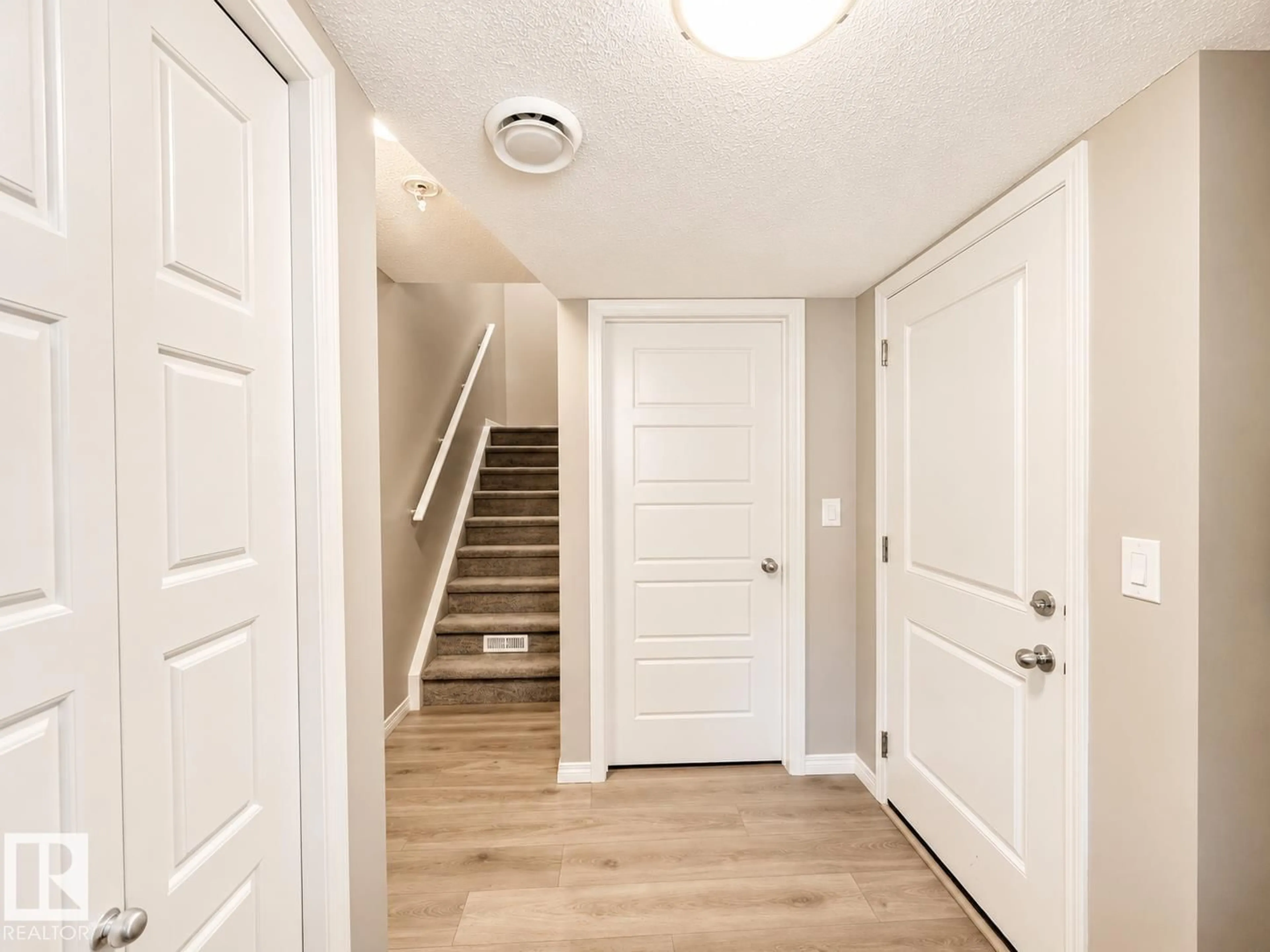 Indoor entryway for 20104 19 AV, Edmonton Alberta T6M0X9