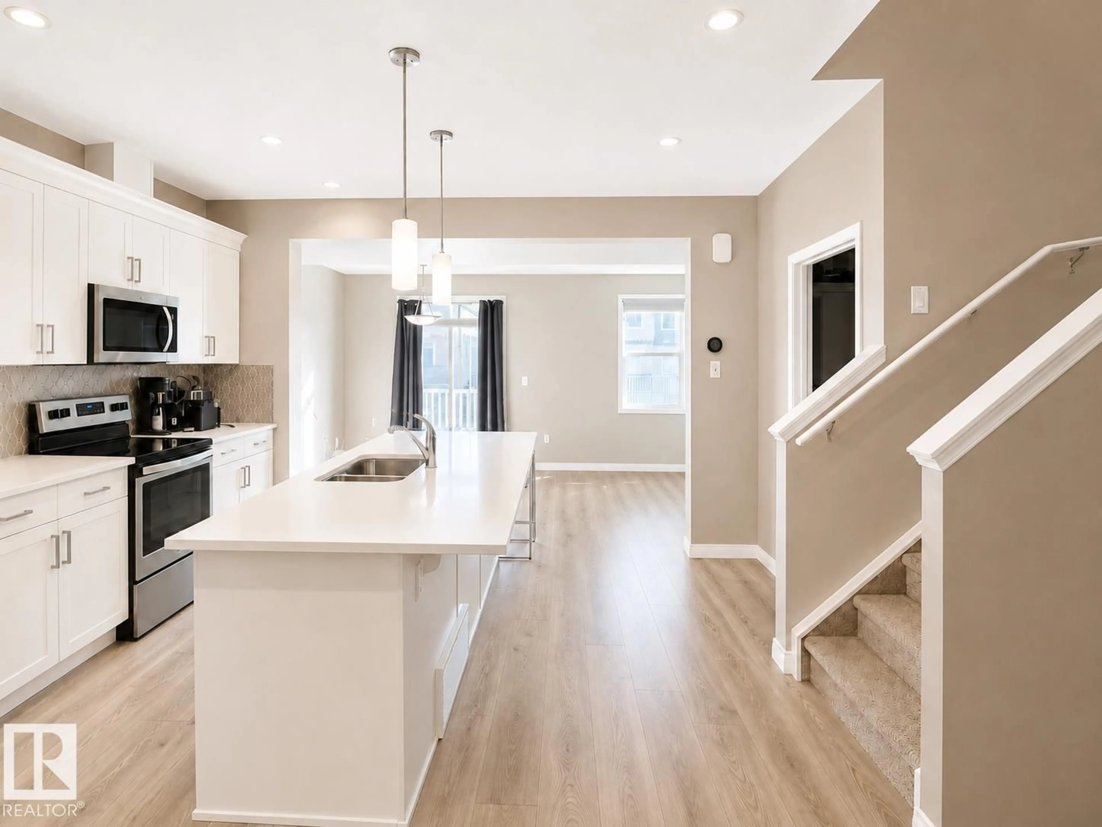 Open concept kitchen, unknown for 20104 19 AV, Edmonton Alberta T6M0X9