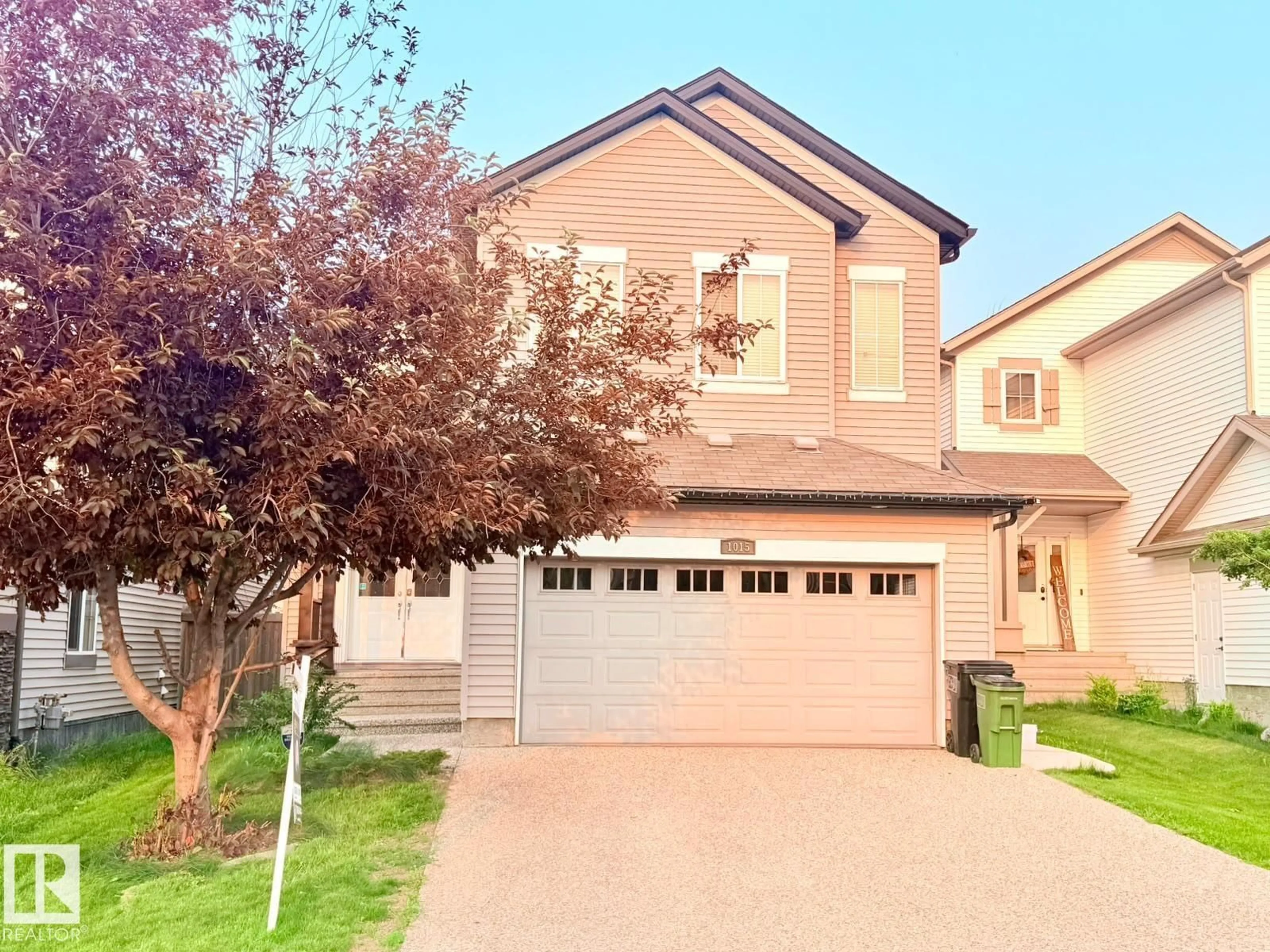Home with vinyl exterior material, street for 1015 61 ST, Edmonton Alberta T6X0M4