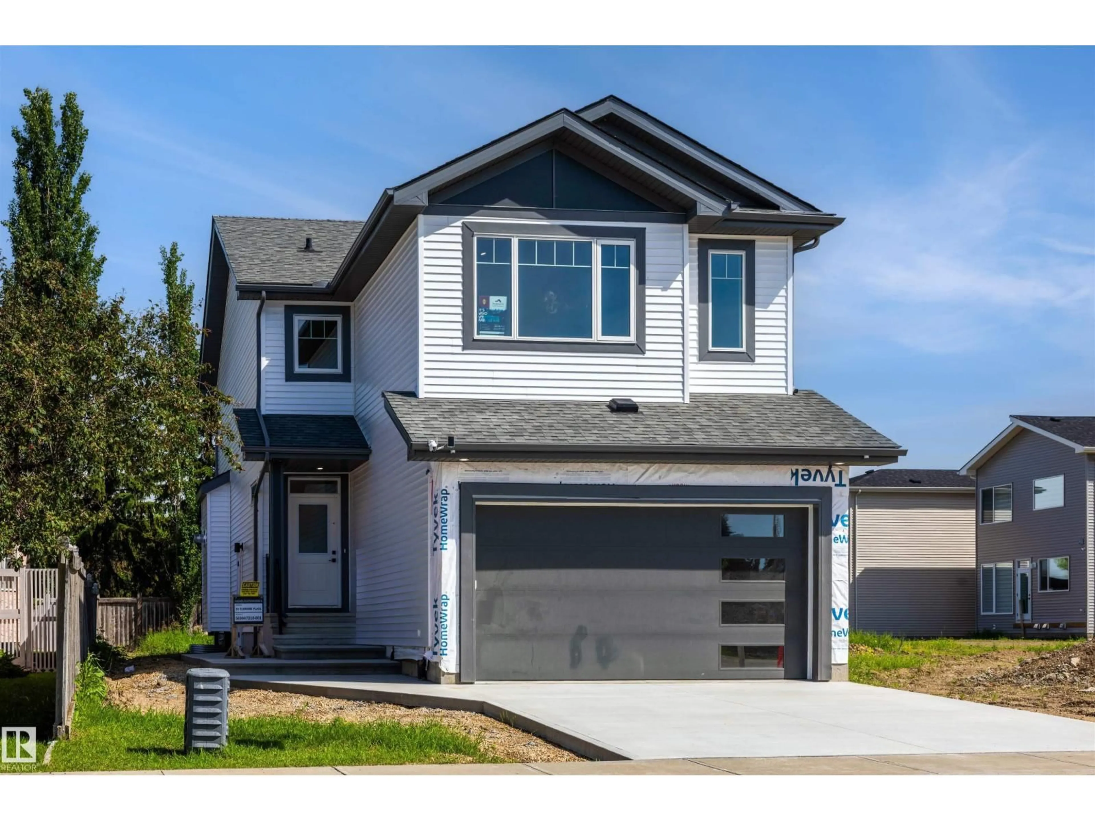 Home with vinyl exterior material, street for 30 ELSINORE PL, Edmonton Alberta T5X0M6