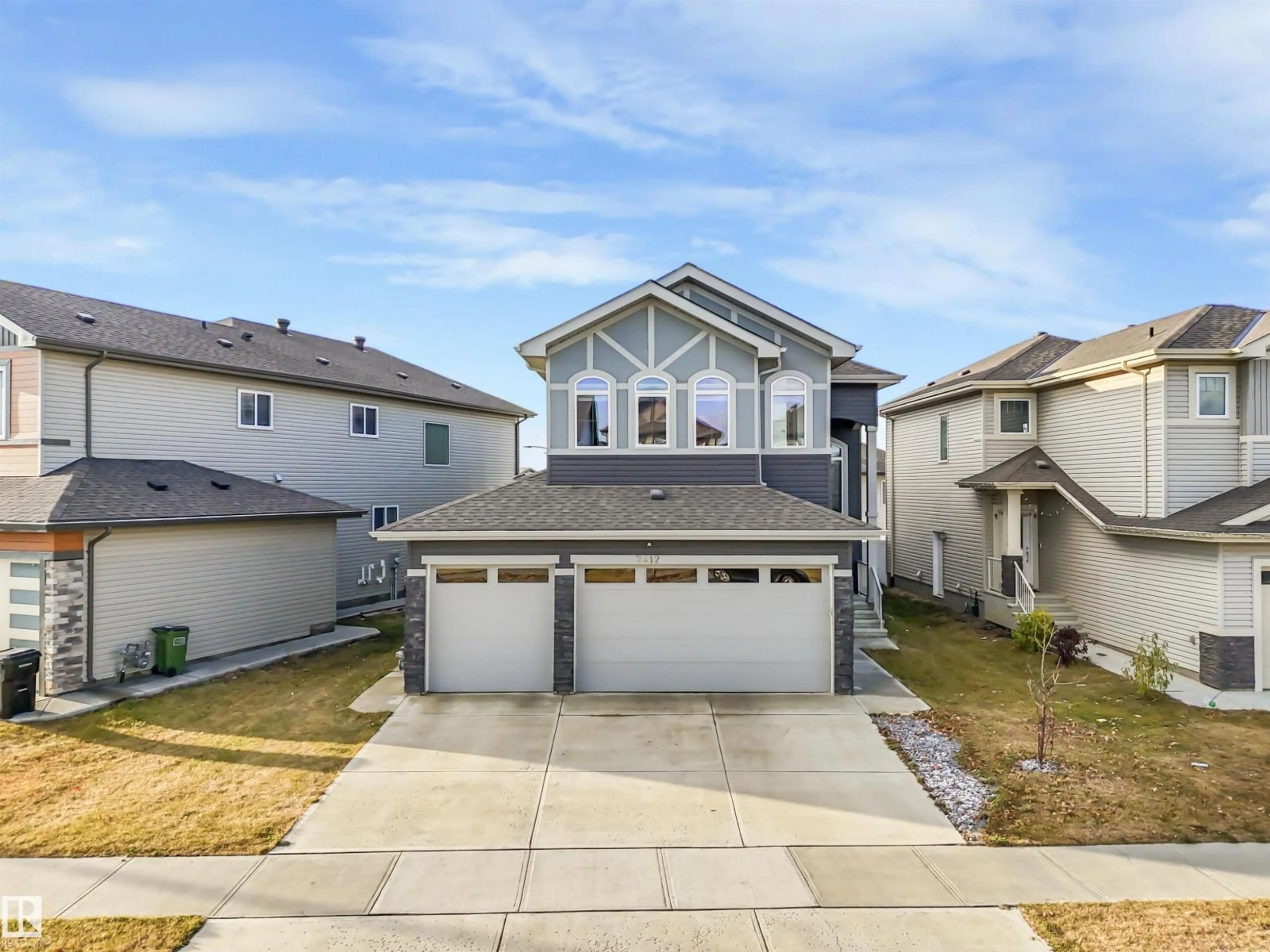 A pic from outside/outdoor area/front of a property/back of a property/a pic from drone, street for 2412 14 AV, Edmonton Alberta T6T2J8
