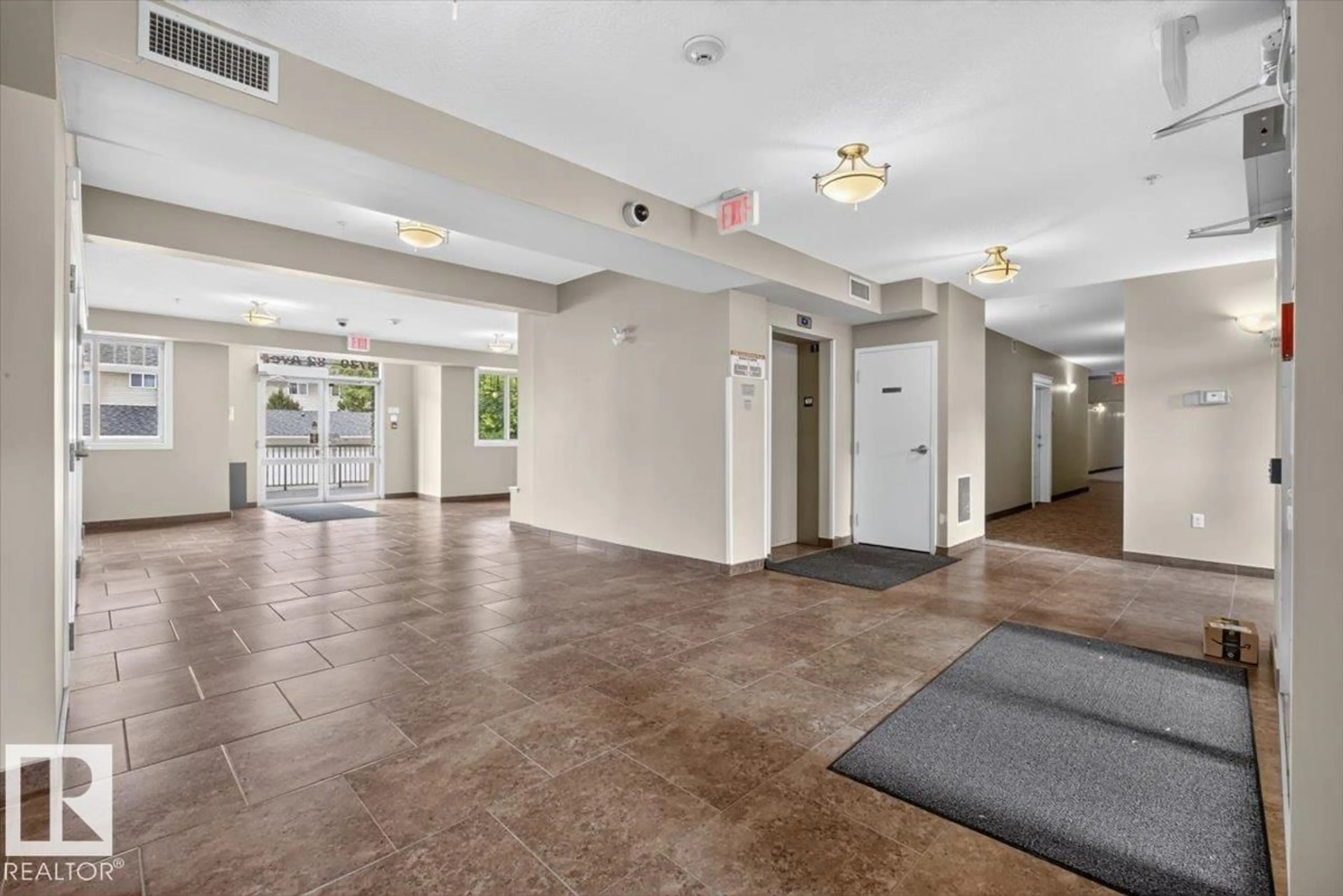 Indoor foyer for #312 - 8730 82 AV, Edmonton Alberta T6C0Z1