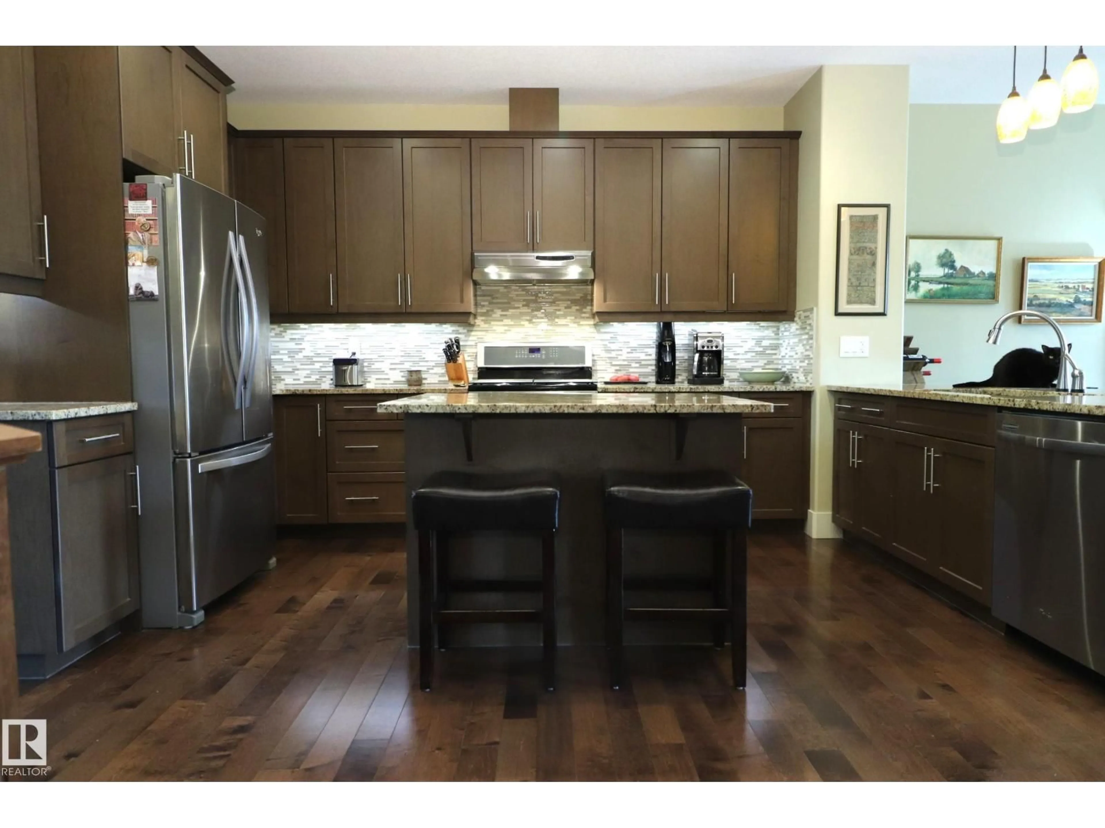 Open concept kitchen, wood/laminate floor for NW - 7492 MAY CM, Edmonton Alberta T6R0G9