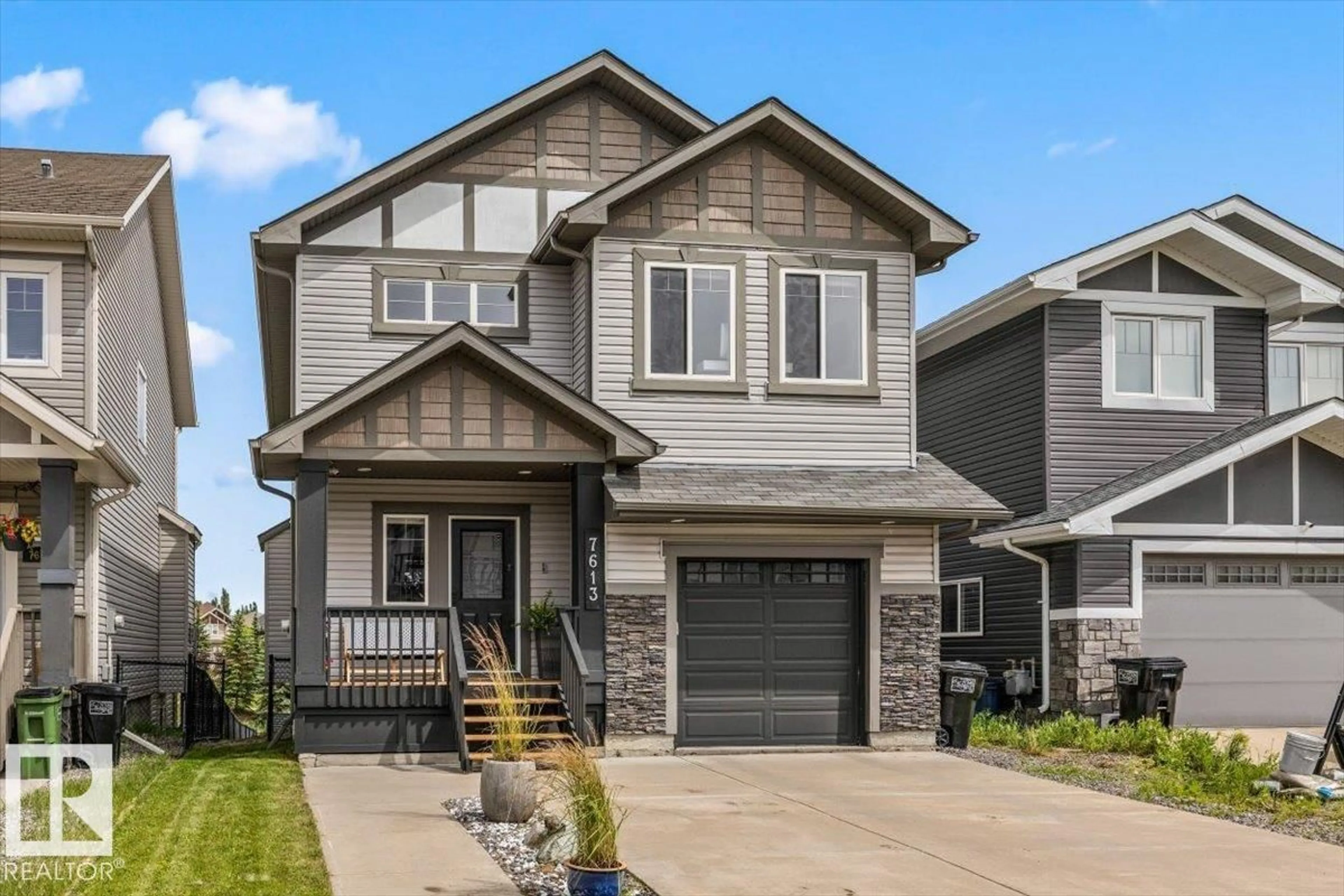 Home with vinyl exterior material, street for 7613 SCHMID CR, Edmonton Alberta T6R0K4