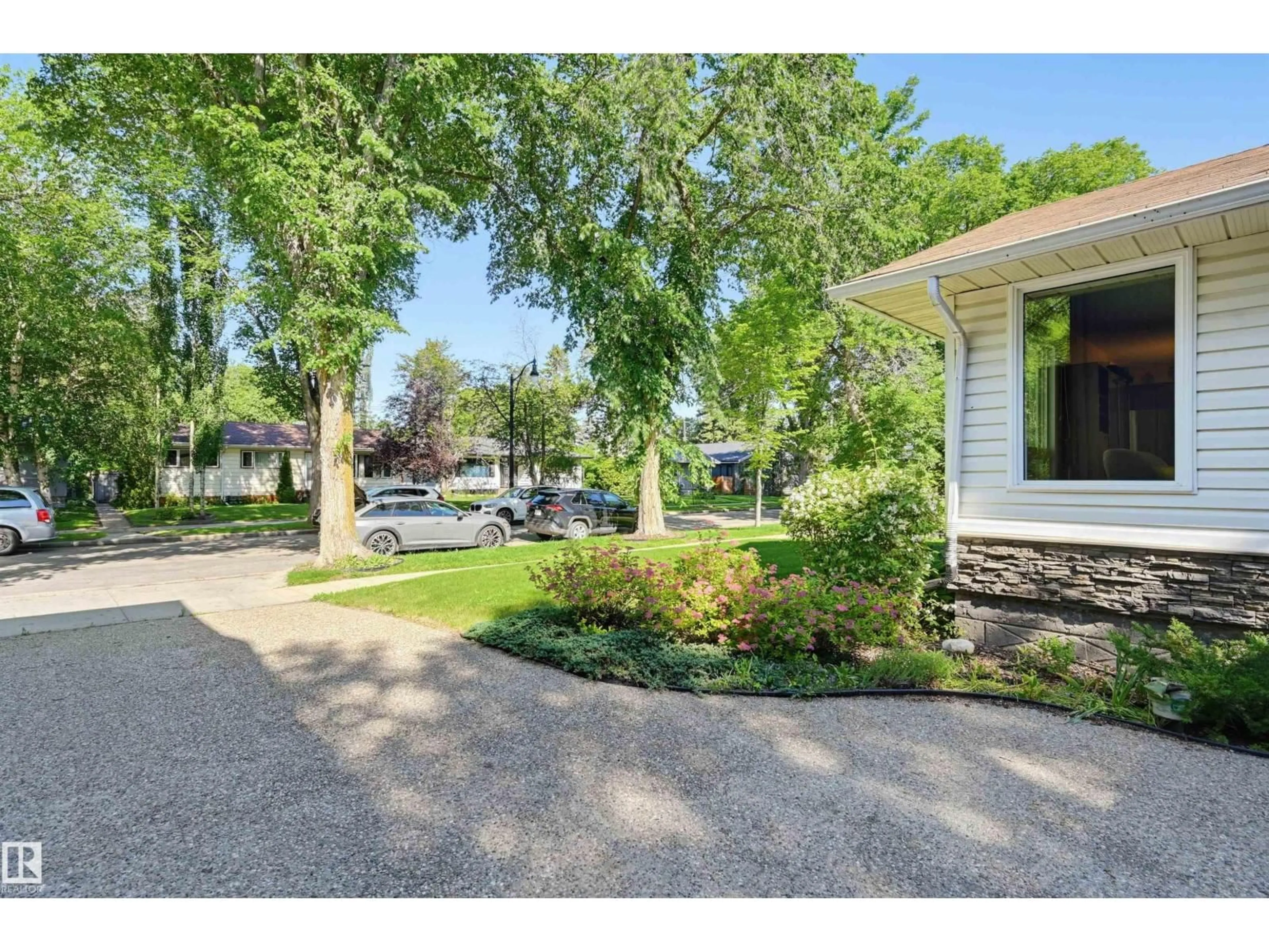 A pic from outside/outdoor area/front of a property/back of a property/a pic from drone, street for NW - 9247 148 ST, Edmonton Alberta T5R1A4
