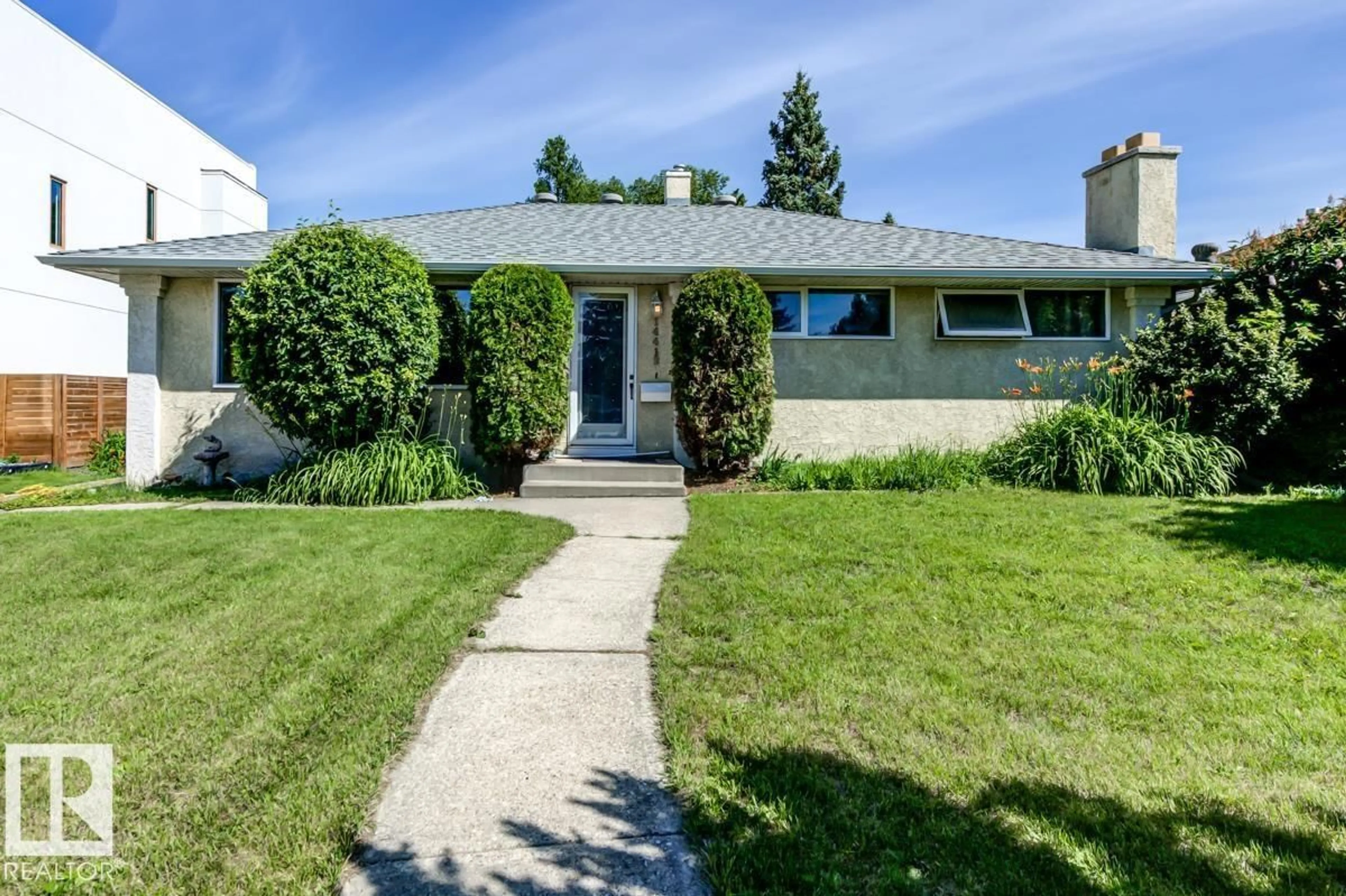 Home with vinyl exterior material, street for 14412 85 AVE, Edmonton Alberta T5R3Z3