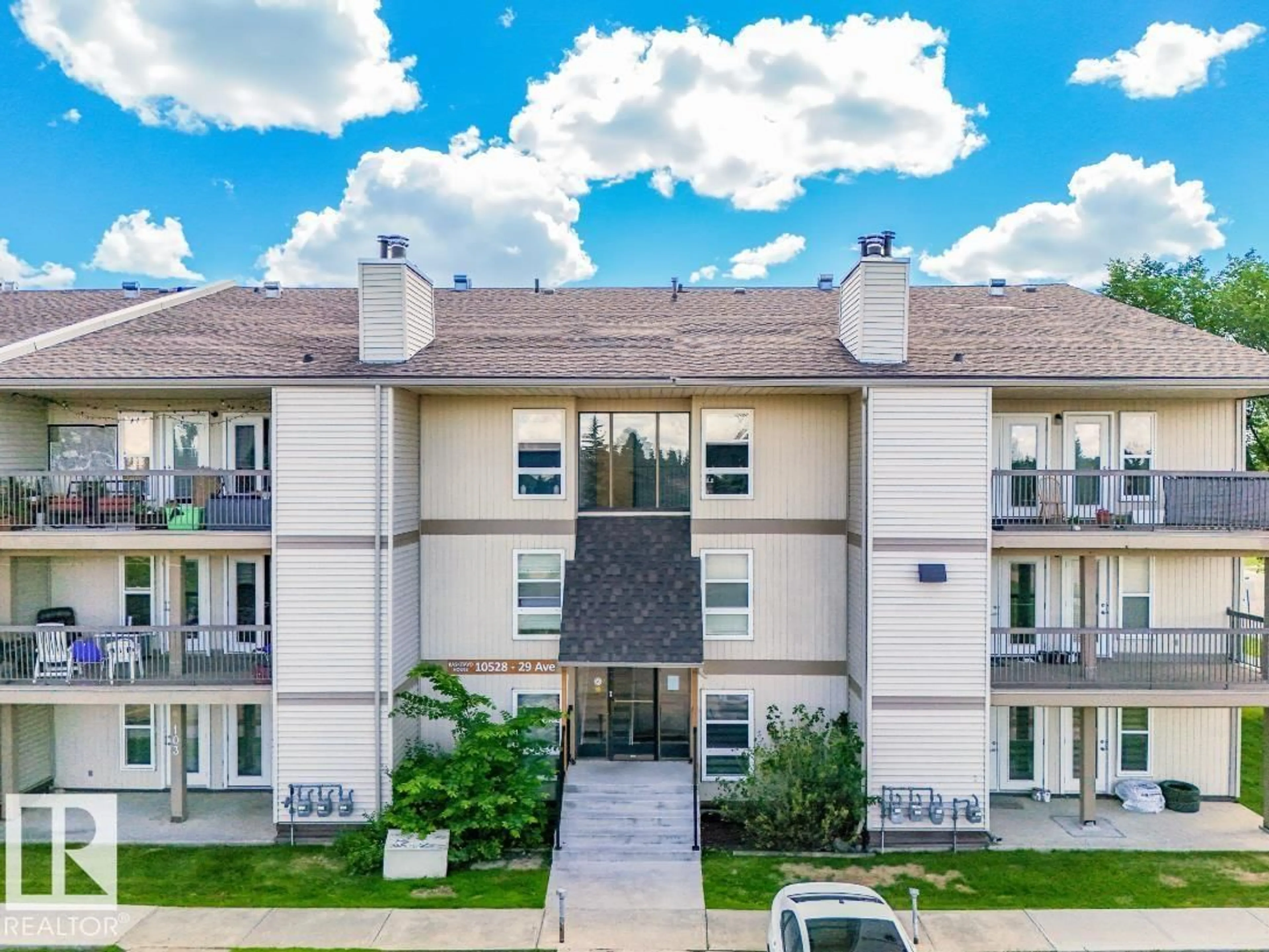 A pic from outside/outdoor area/front of a property/back of a property/a pic from drone, mountain view for #301 - 10528 29 AV, Edmonton Alberta T6J4J2