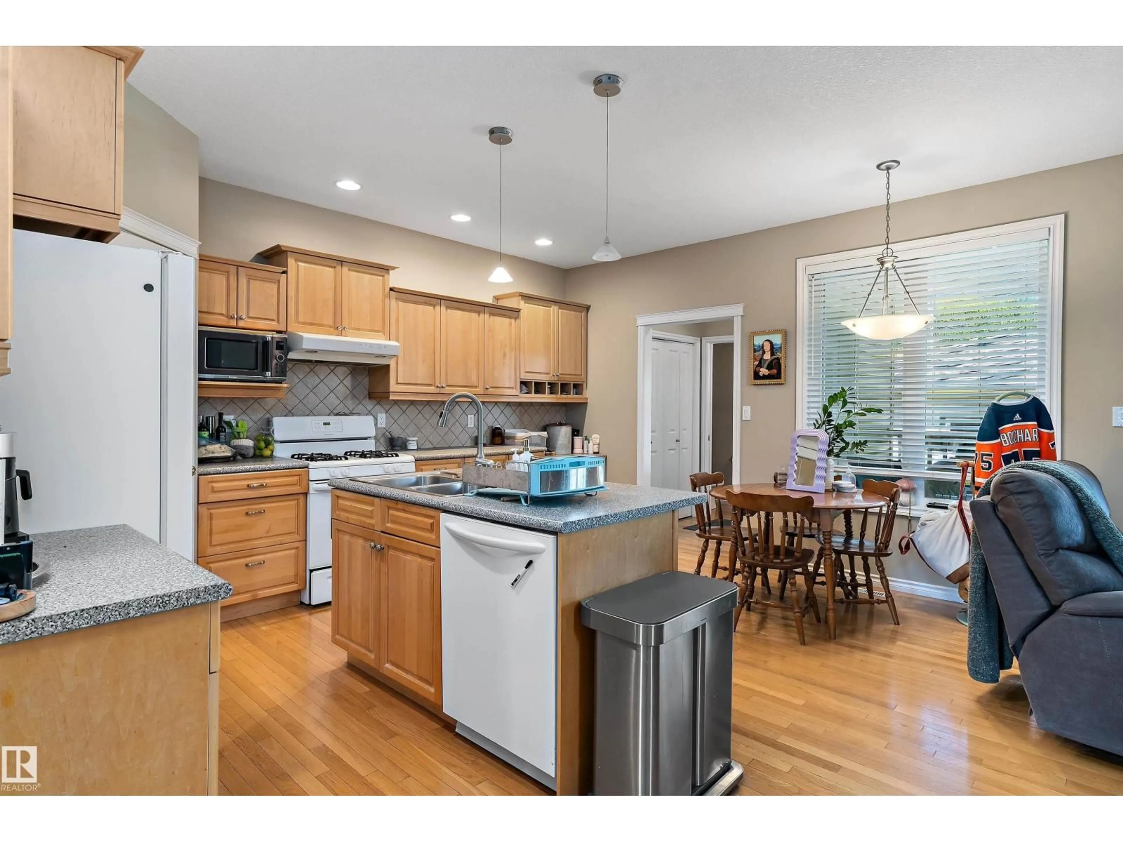 Open concept kitchen, unknown for 10506 82 ST, Edmonton Alberta T6A3M8