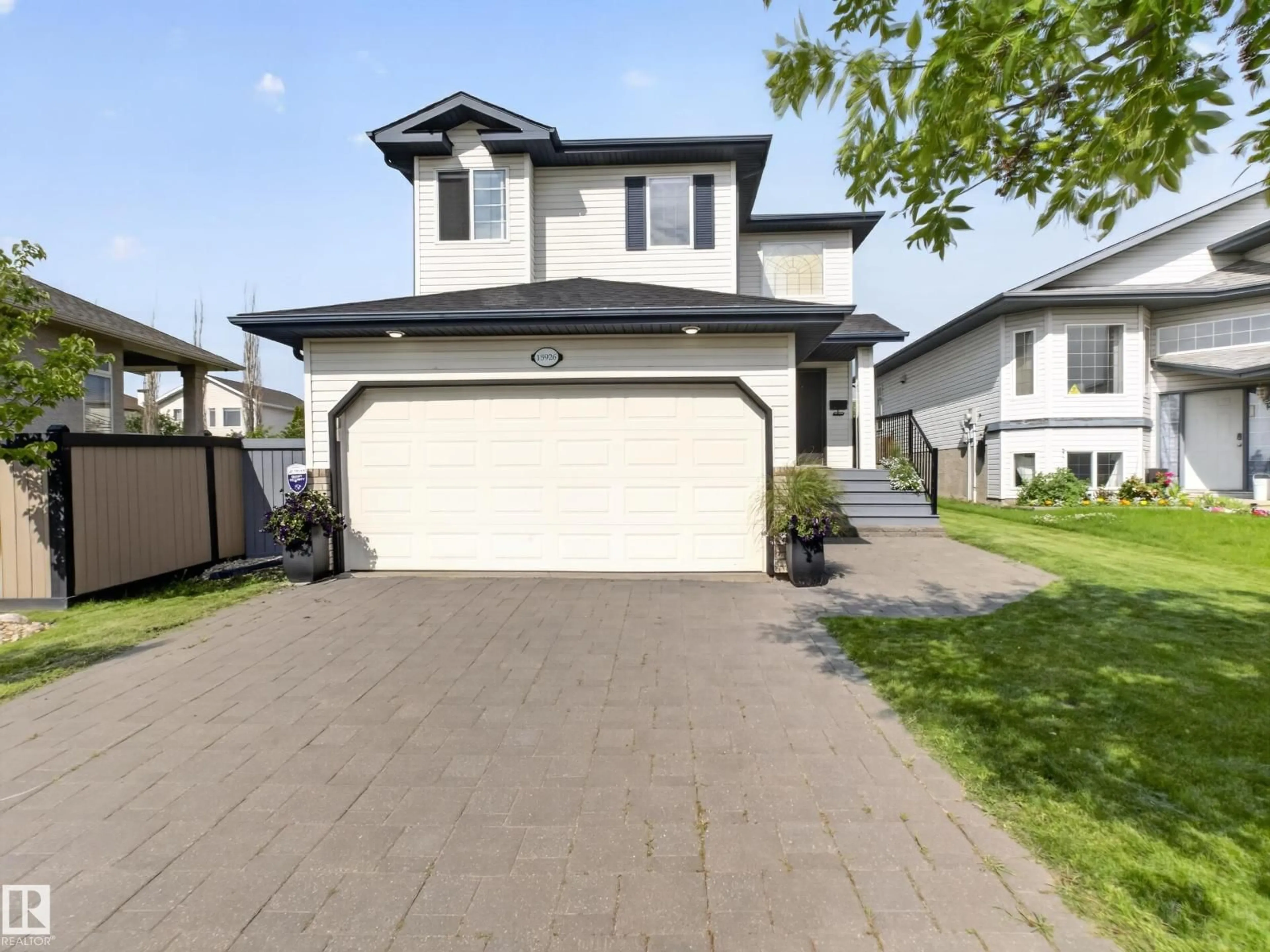 Home with vinyl exterior material, street for NW - 15926 132 ST, Edmonton Alberta T6V1E4