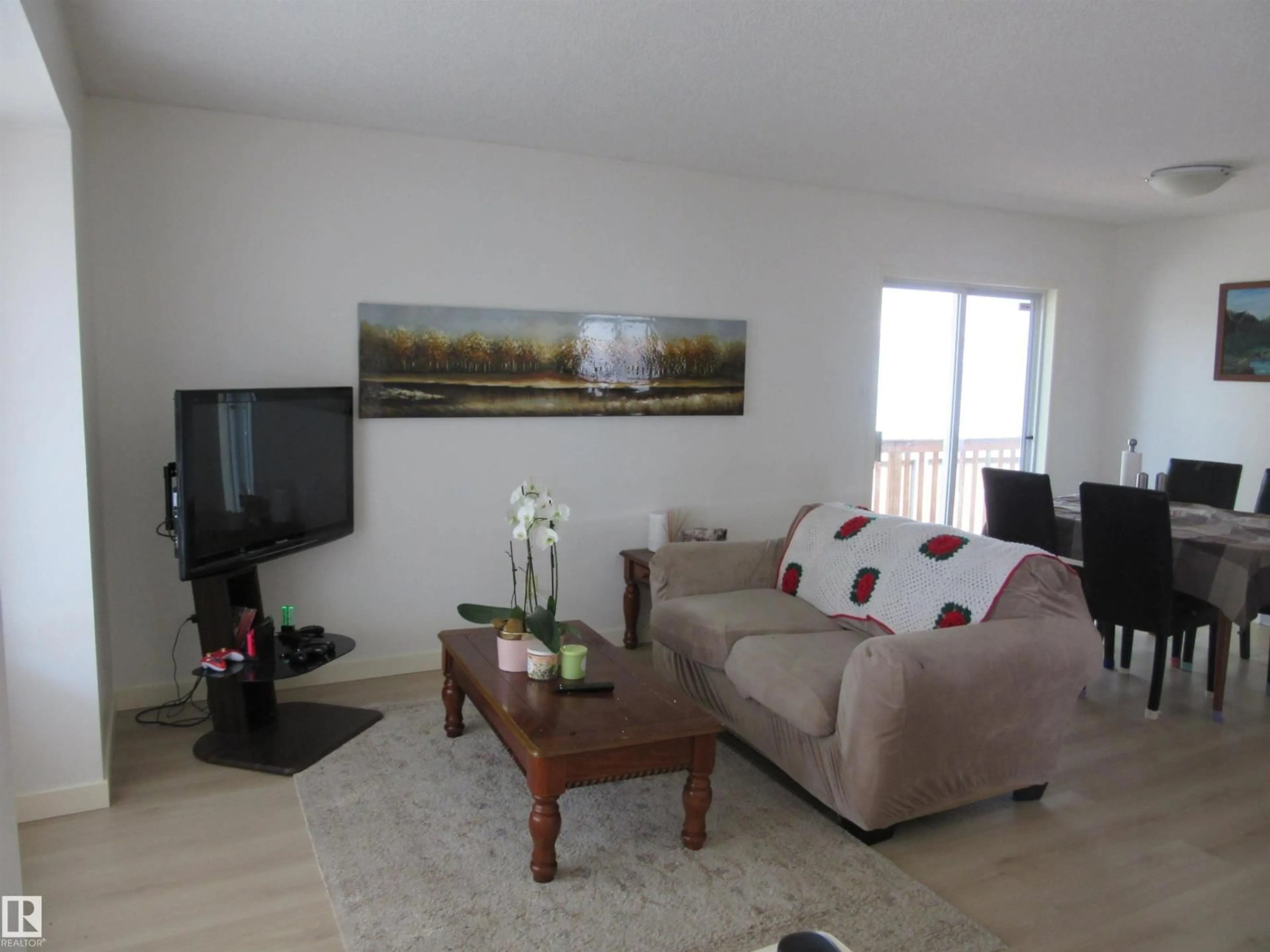 Living room with furniture, wood/laminate floor for 64 HEATHERGLEN CL, Spruce Grove Alberta T7X4A3