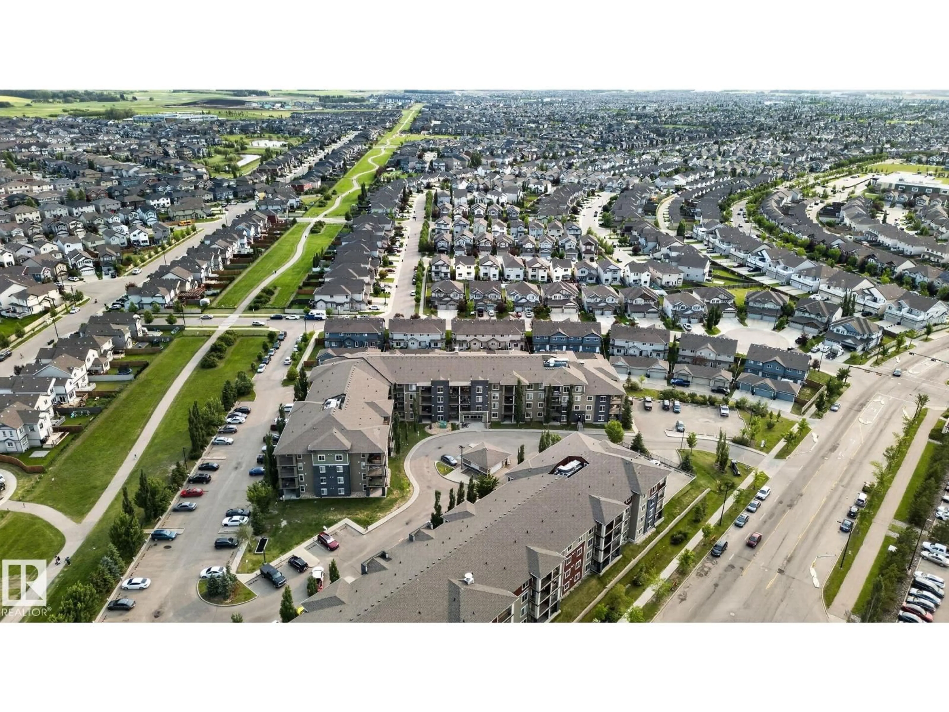 A pic from outside/outdoor area/front of a property/back of a property/a pic from drone, street for 415 WATT CM, Edmonton Alberta T6X2C6