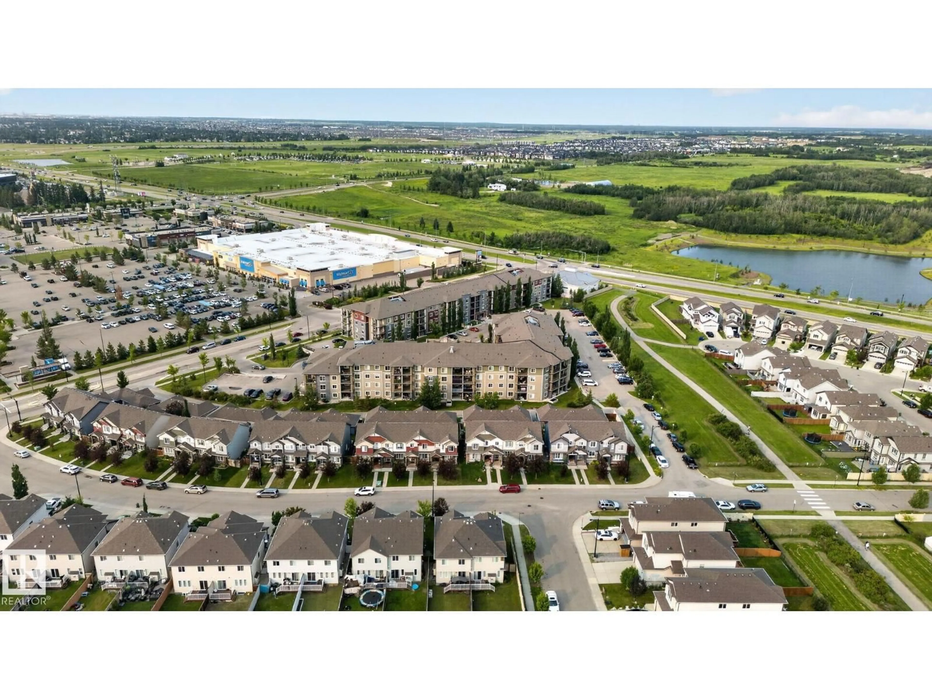A pic from outside/outdoor area/front of a property/back of a property/a pic from drone, unknown for 415 WATT CM, Edmonton Alberta T6X2C6