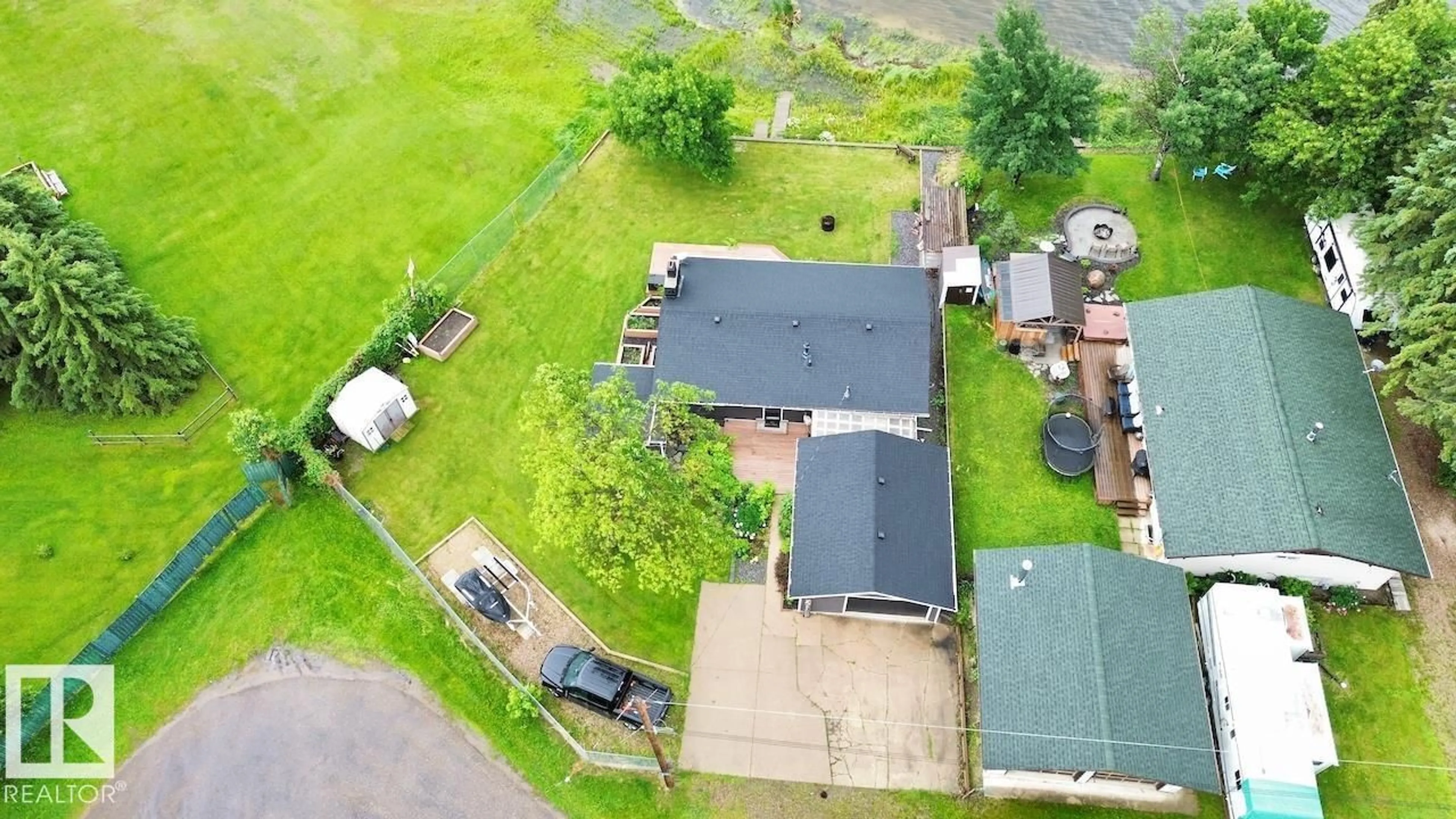 A pic from outside/outdoor area/front of a property/back of a property/a pic from drone, unknown for 623 LAKEVIEW ROAD, Rural Athabasca County Alberta T0A0M0