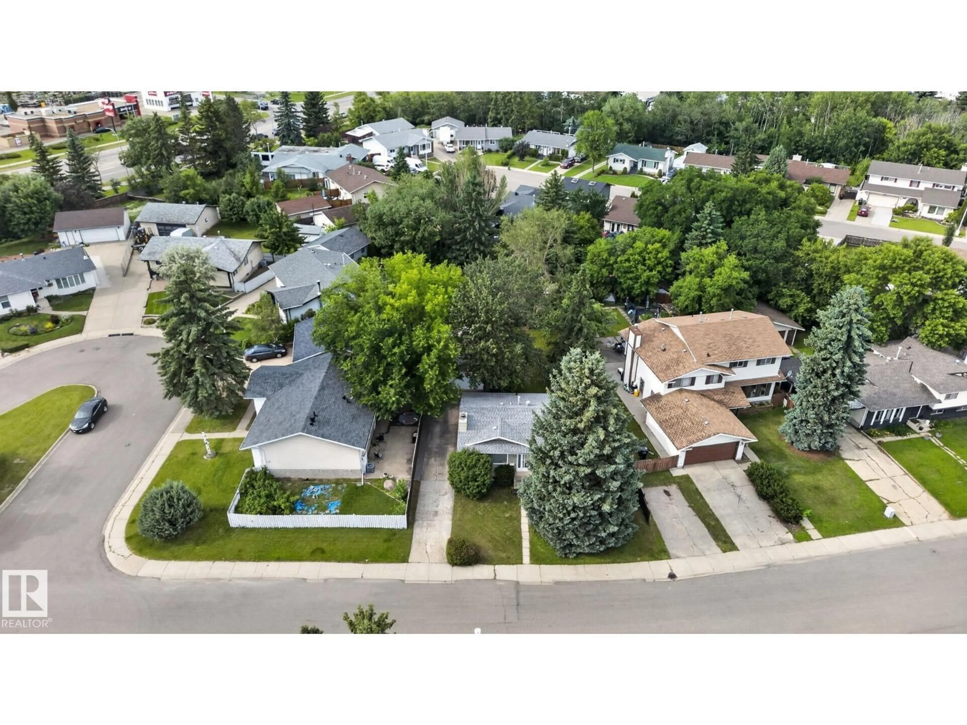A pic from outside/outdoor area/front of a property/back of a property/a pic from drone, street for 4712 131 AV, Edmonton Alberta T5A3G6