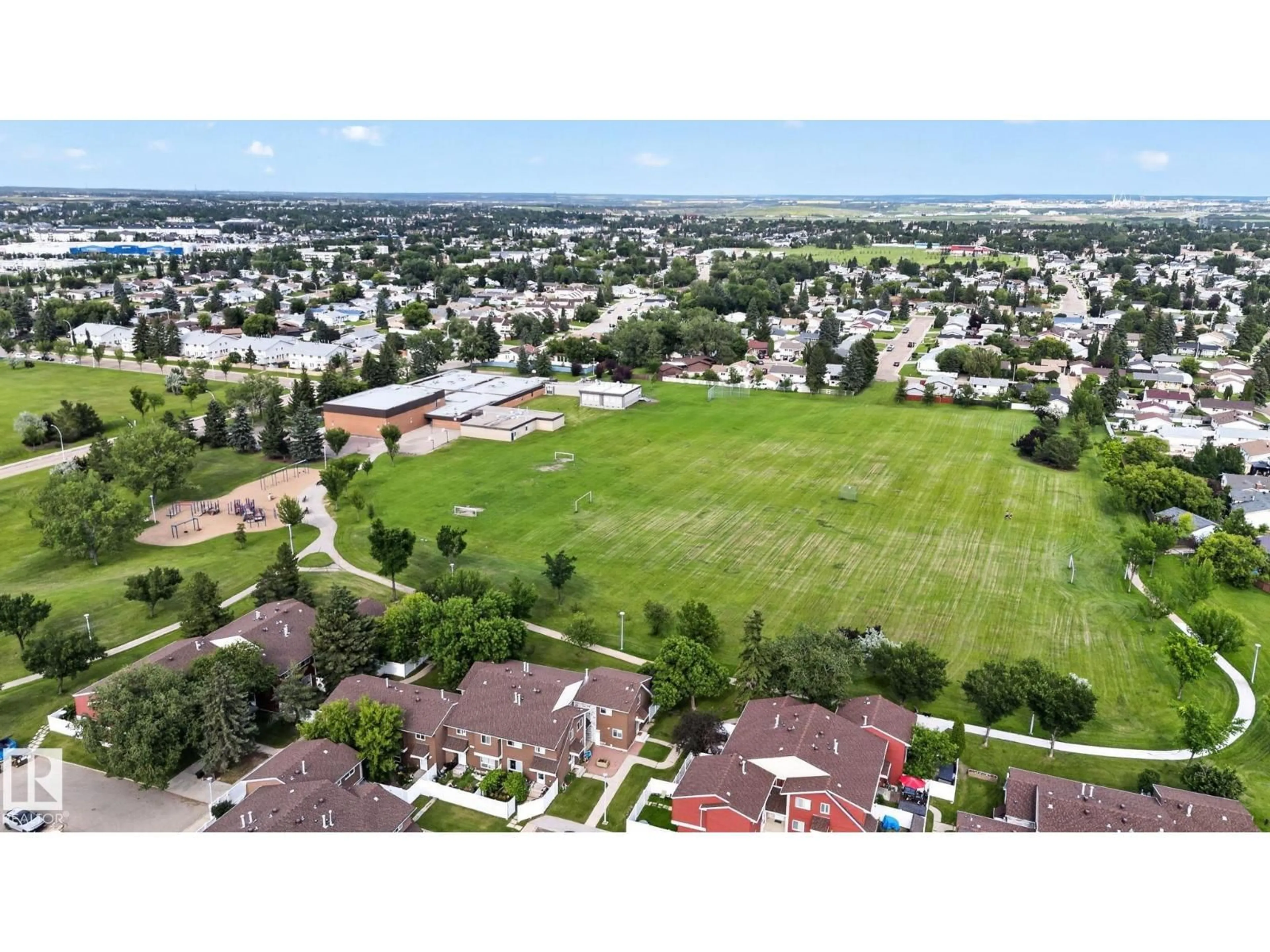 A pic from outside/outdoor area/front of a property/back of a property/a pic from drone, mountain view for 4712 131 AV, Edmonton Alberta T5A3G6