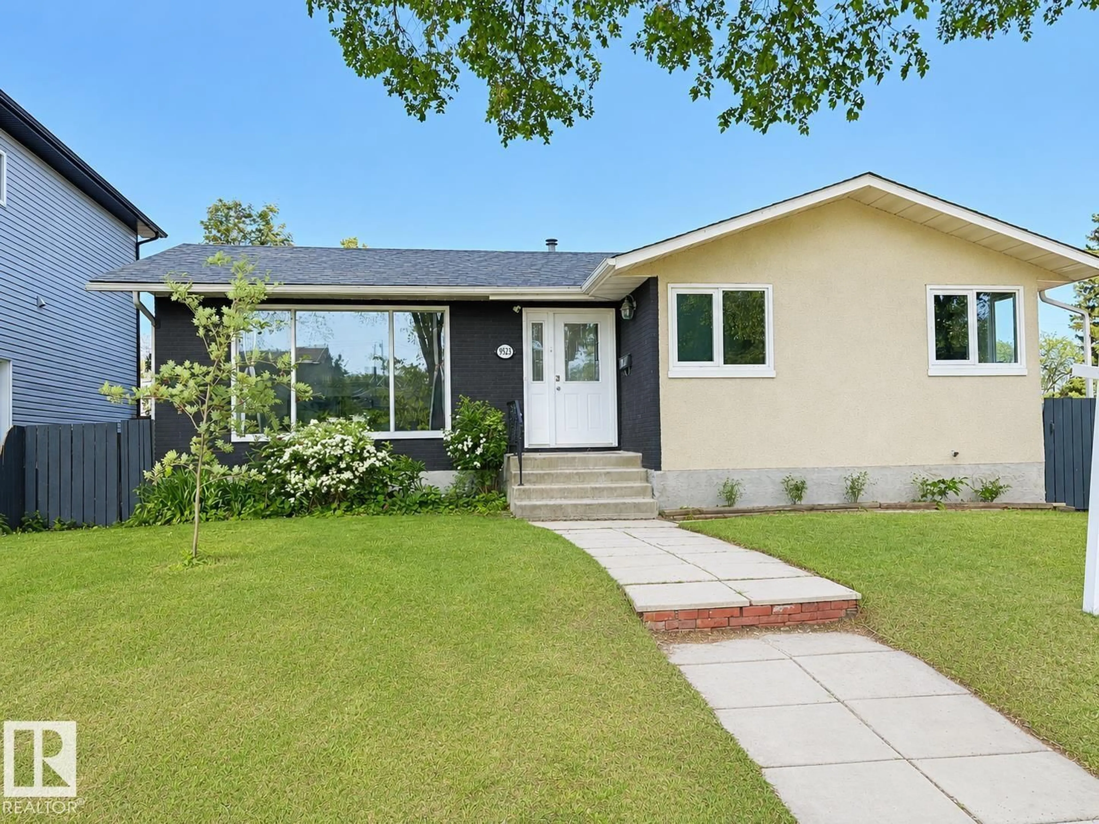 Home with vinyl exterior material, street for 9523 151 ST, Edmonton Alberta T5P1S2