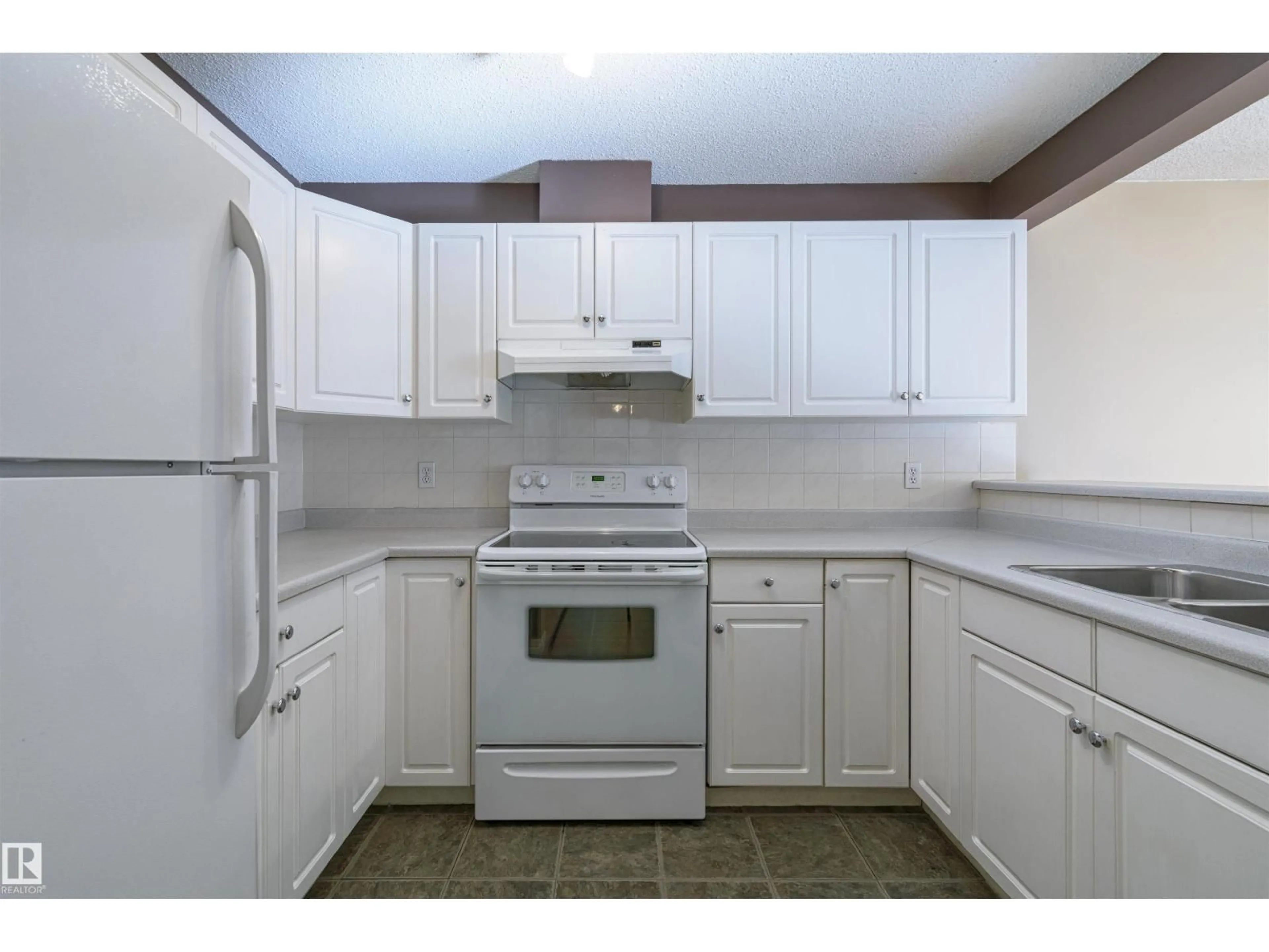 Standard kitchen, unknown for #107 - 10153 117 ST, Edmonton Alberta T5K1X5