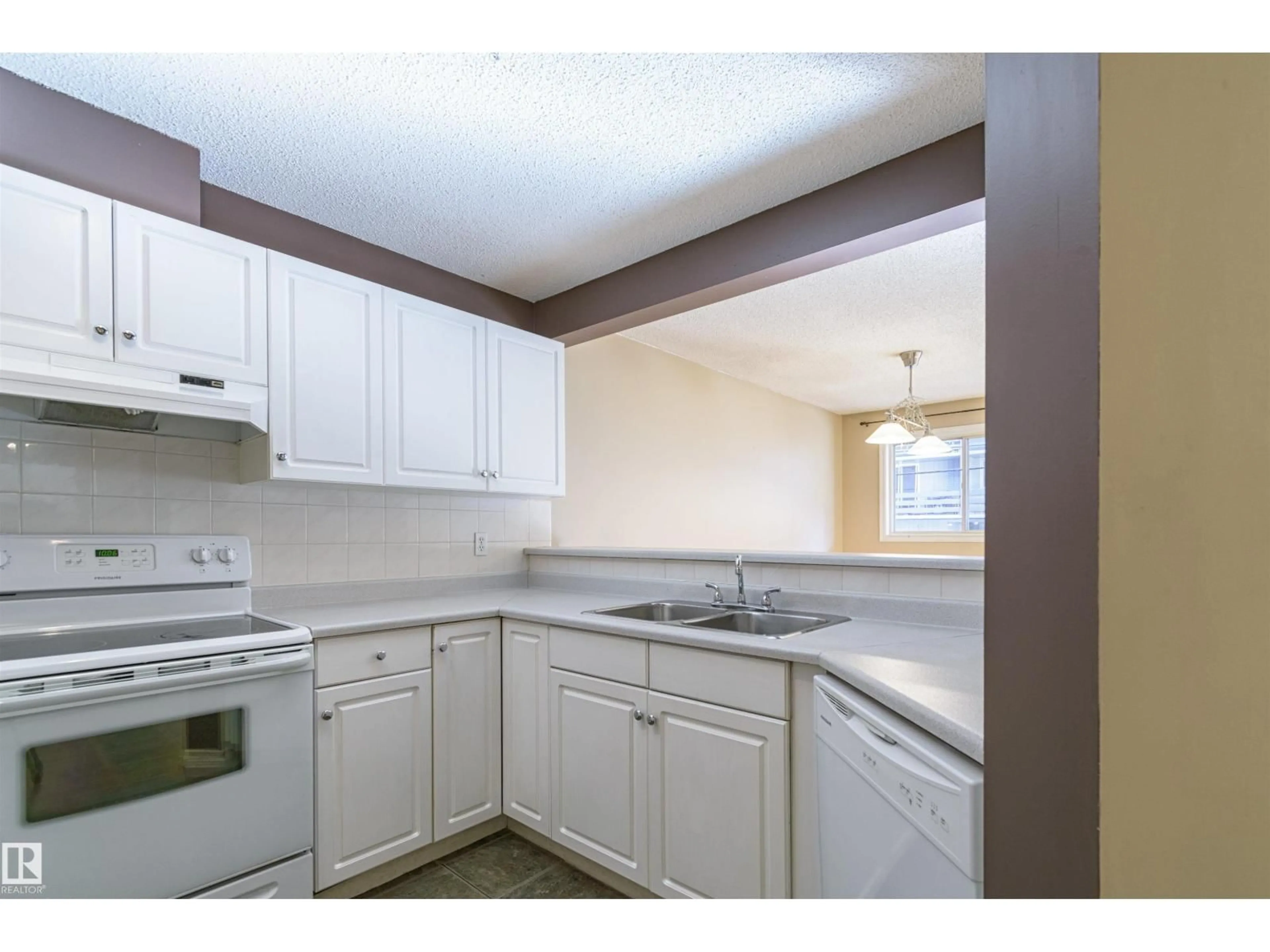 Standard kitchen, unknown for #107 - 10153 117 ST, Edmonton Alberta T5K1X5