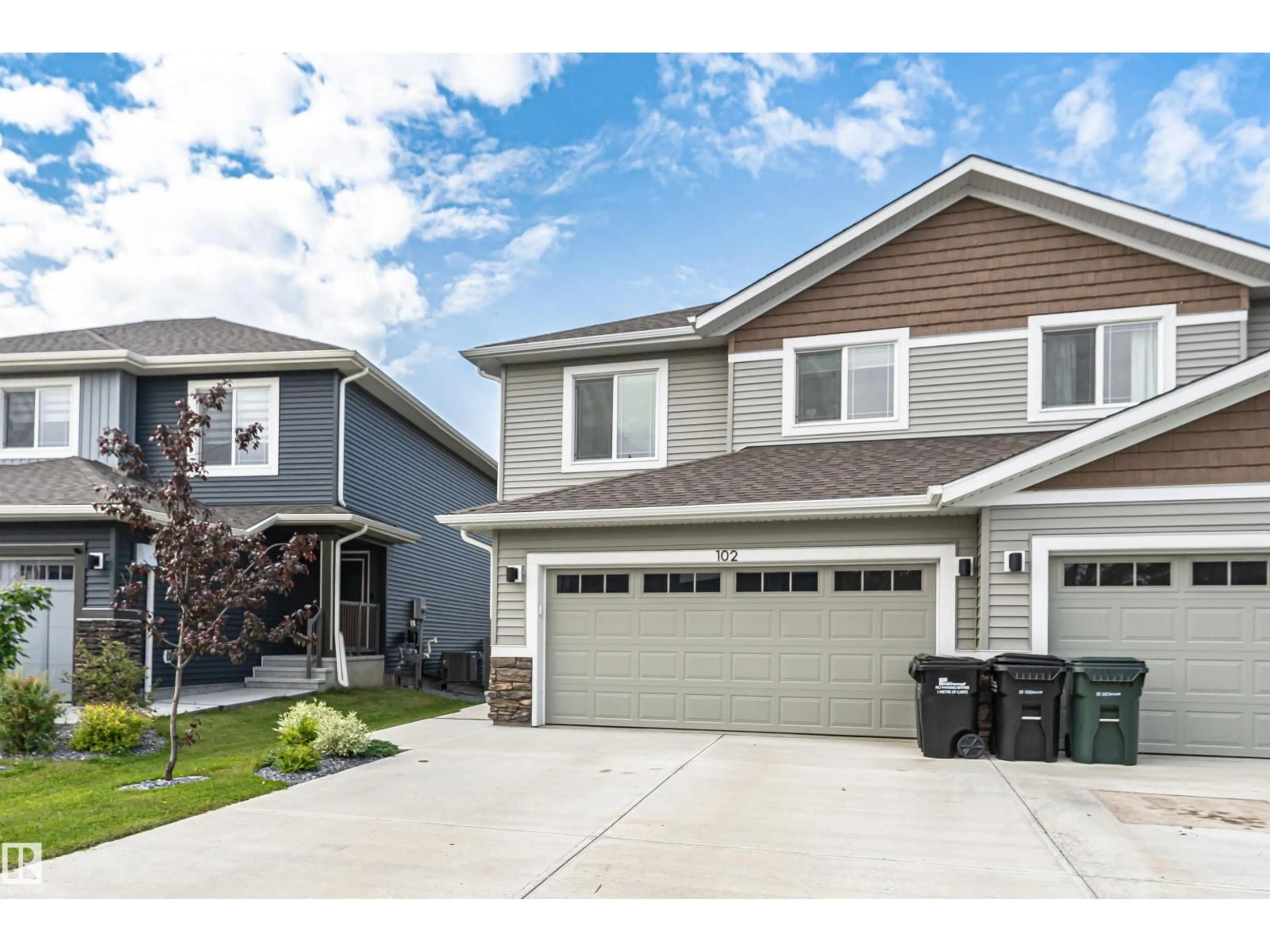 Home with vinyl exterior material, street for 102 HORTON WY, Ardrossan Alberta T8E0B2