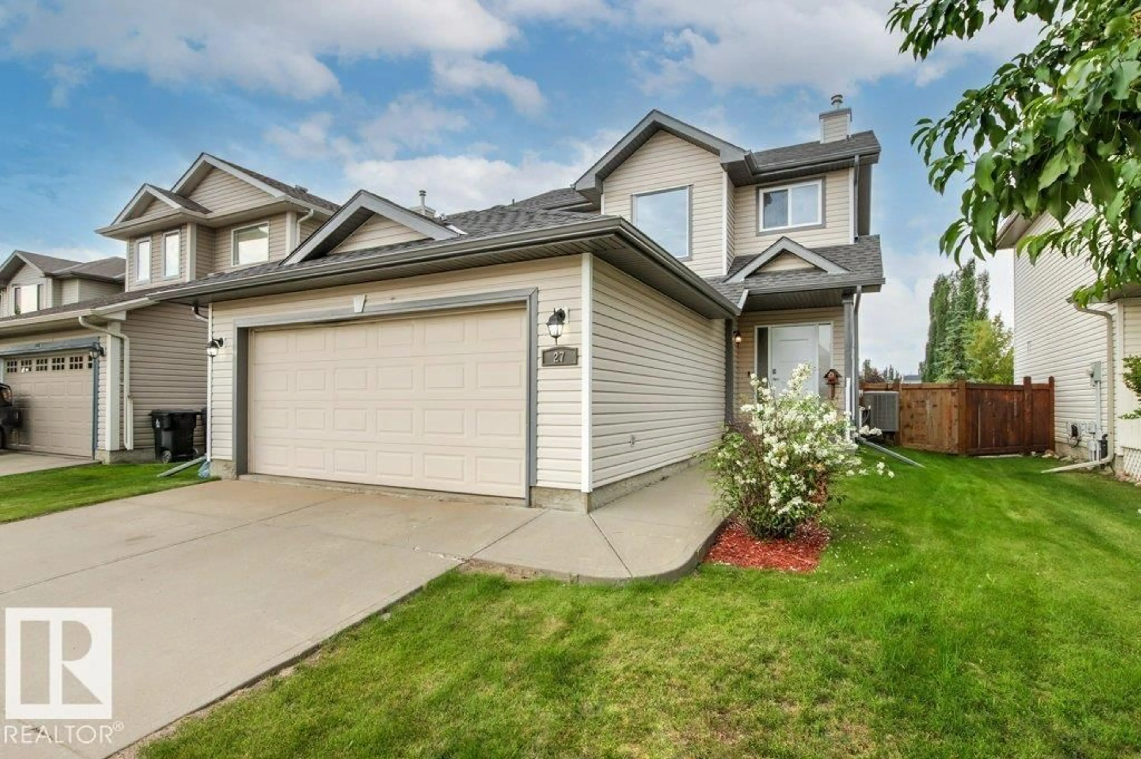 A pic from outside/outdoor area/front of a property/back of a property/a pic from drone, street for 27 SPRUCE RIDGE DR, Spruce Grove Alberta T7X4M8