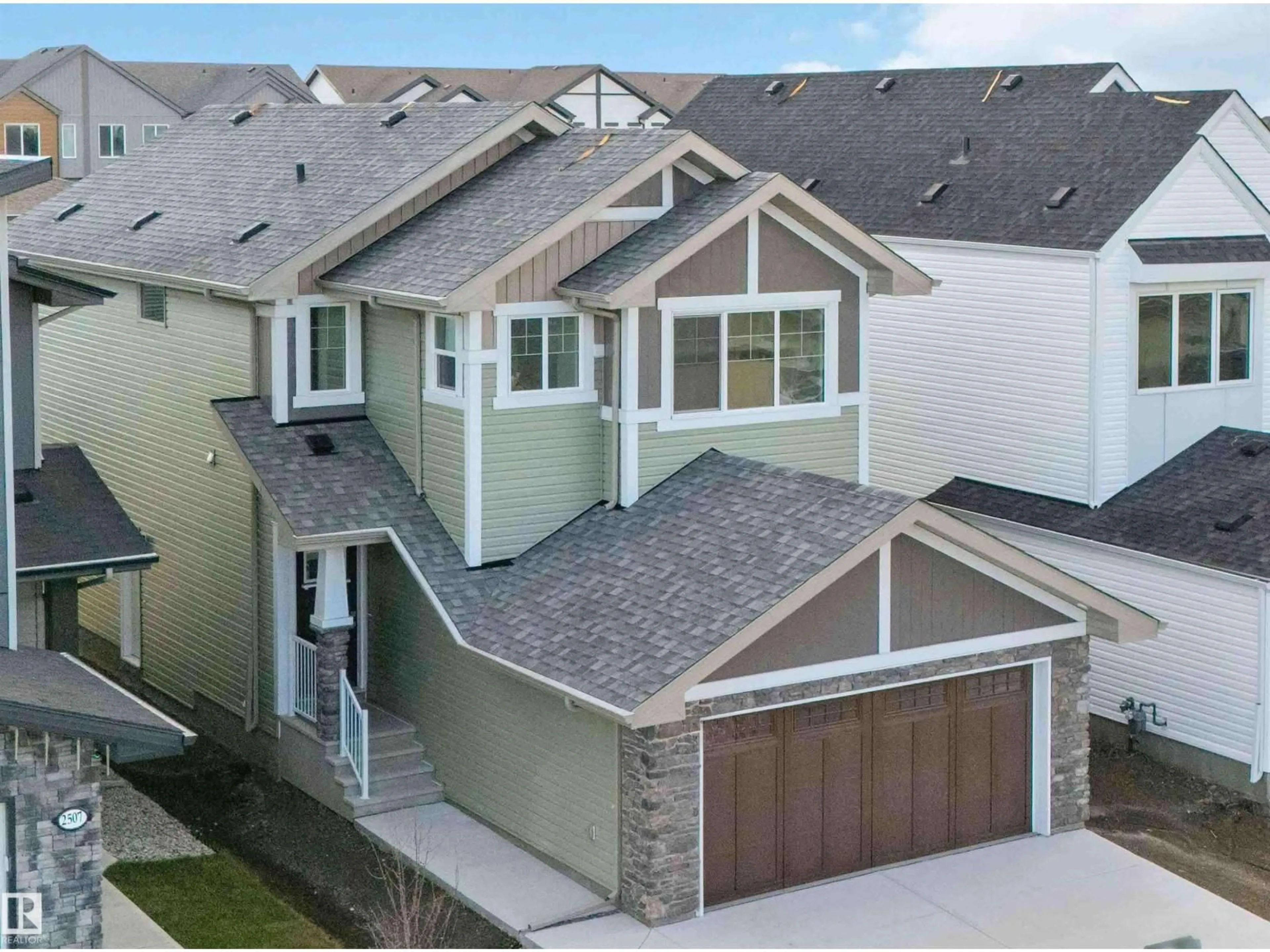 A pic from outside/outdoor area/front of a property/back of a property/a pic from drone, street for 2503 194 ST NW, Edmonton Alberta T6M1P5