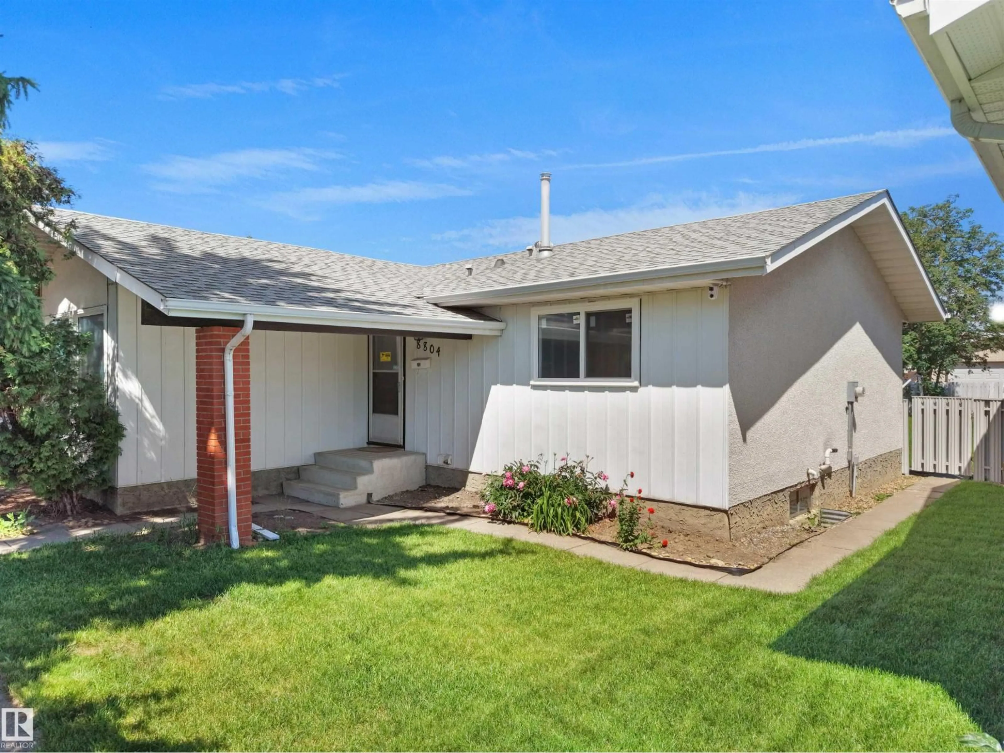 Home with vinyl exterior material, street for 8804 19 AV, Edmonton Alberta T6K1Z6