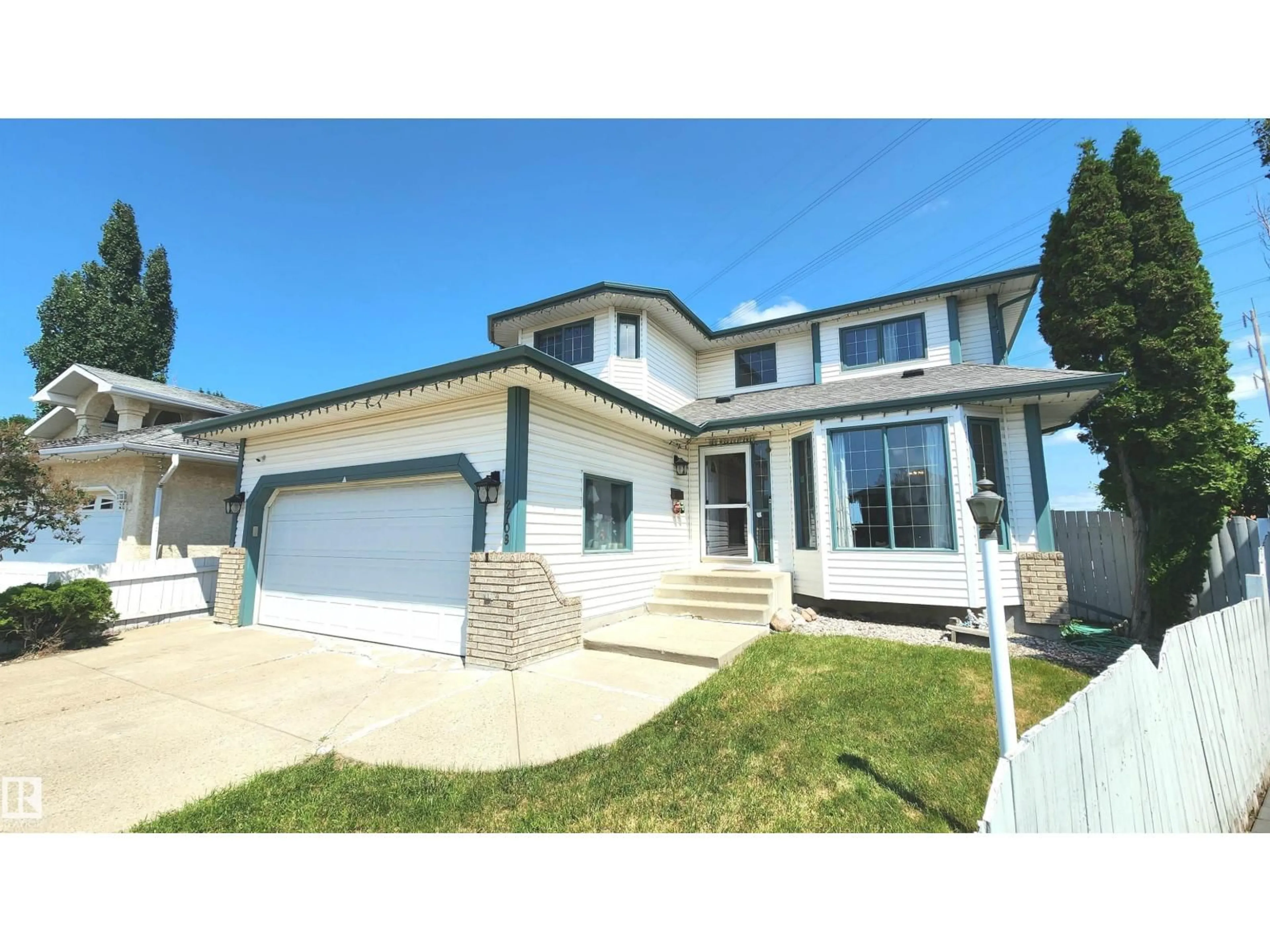 Home with vinyl exterior material, street for NW - 2708 44A AV, Edmonton Alberta T6T1K1