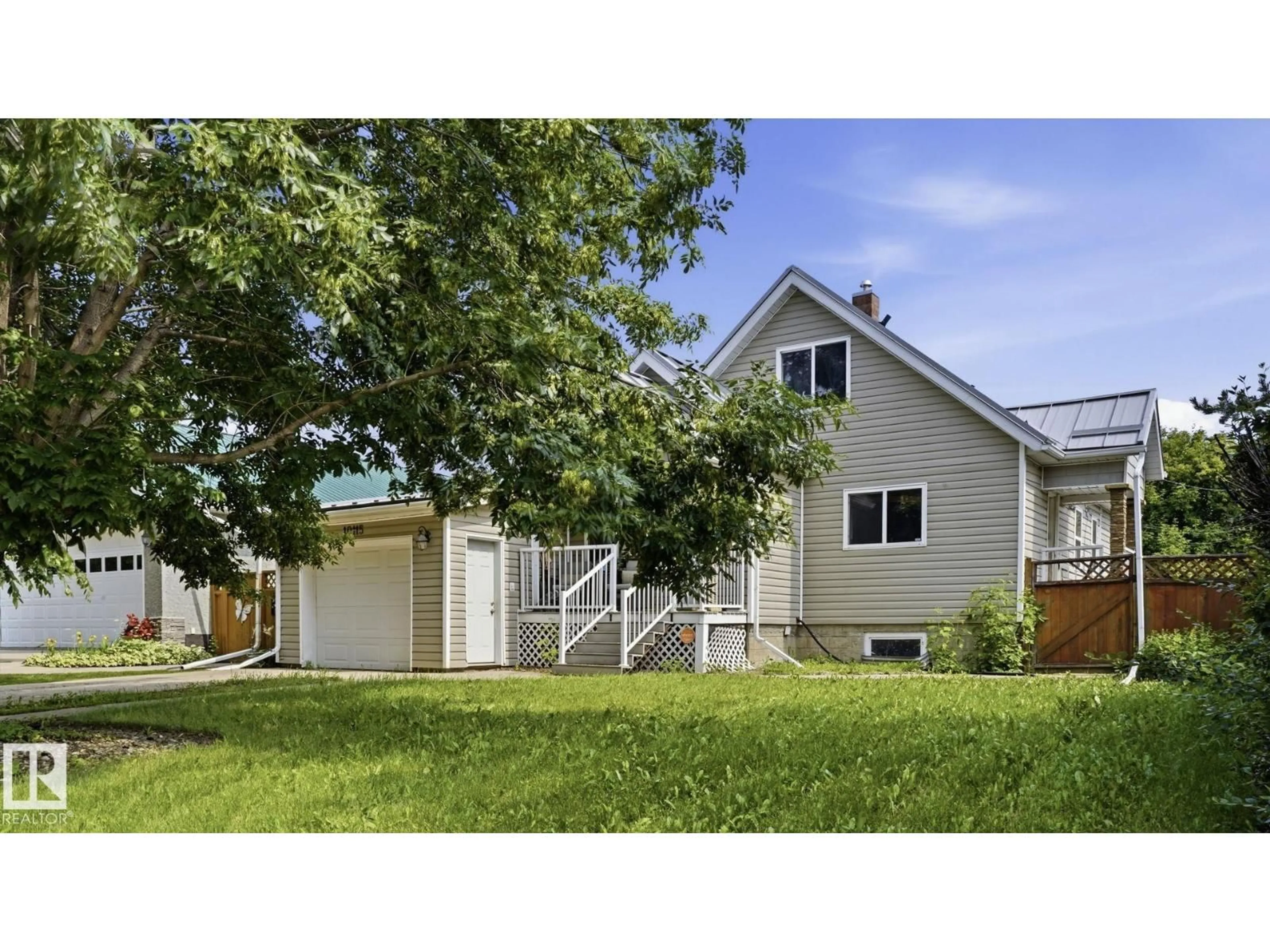 Home with vinyl exterior material, street for 10115 104 ST, Westlock Alberta T9P1V3