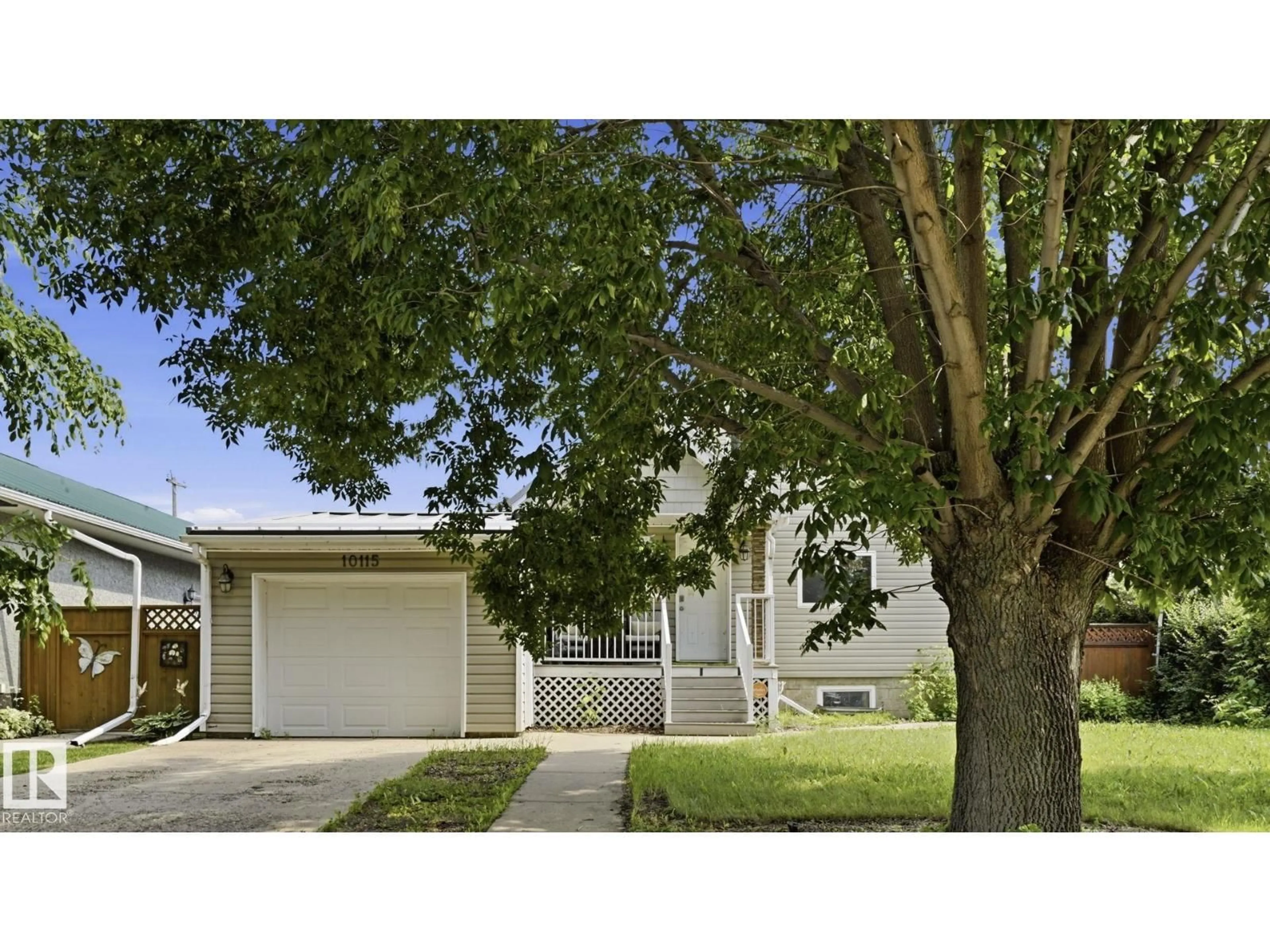 Home with vinyl exterior material, street for 10115 104 ST, Westlock Alberta T9P1V3