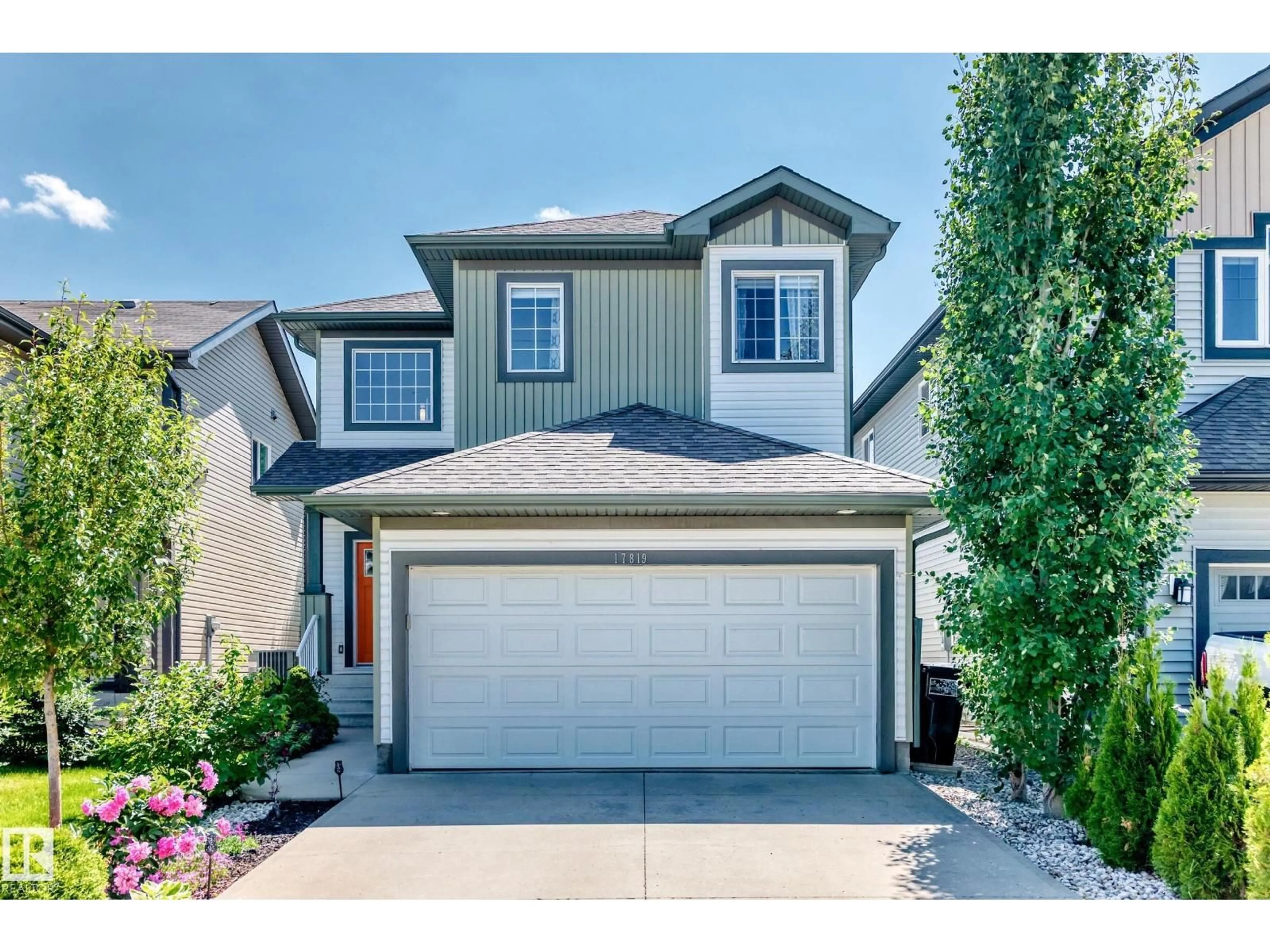 Home with vinyl exterior material, street for 17819 8 AV, Edmonton Alberta T6W2S6