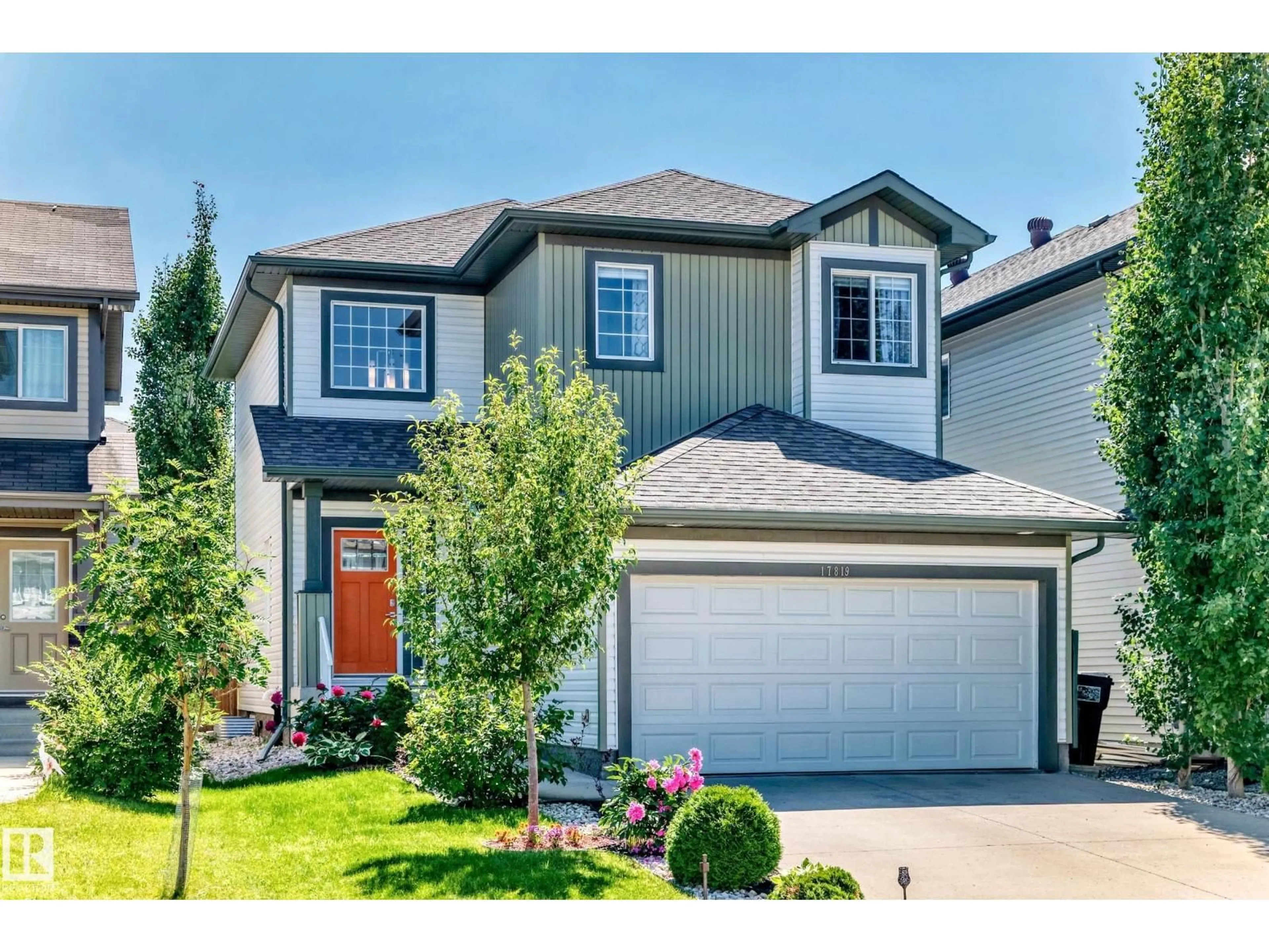 Home with vinyl exterior material, street for 17819 8 AV, Edmonton Alberta T6W2S6
