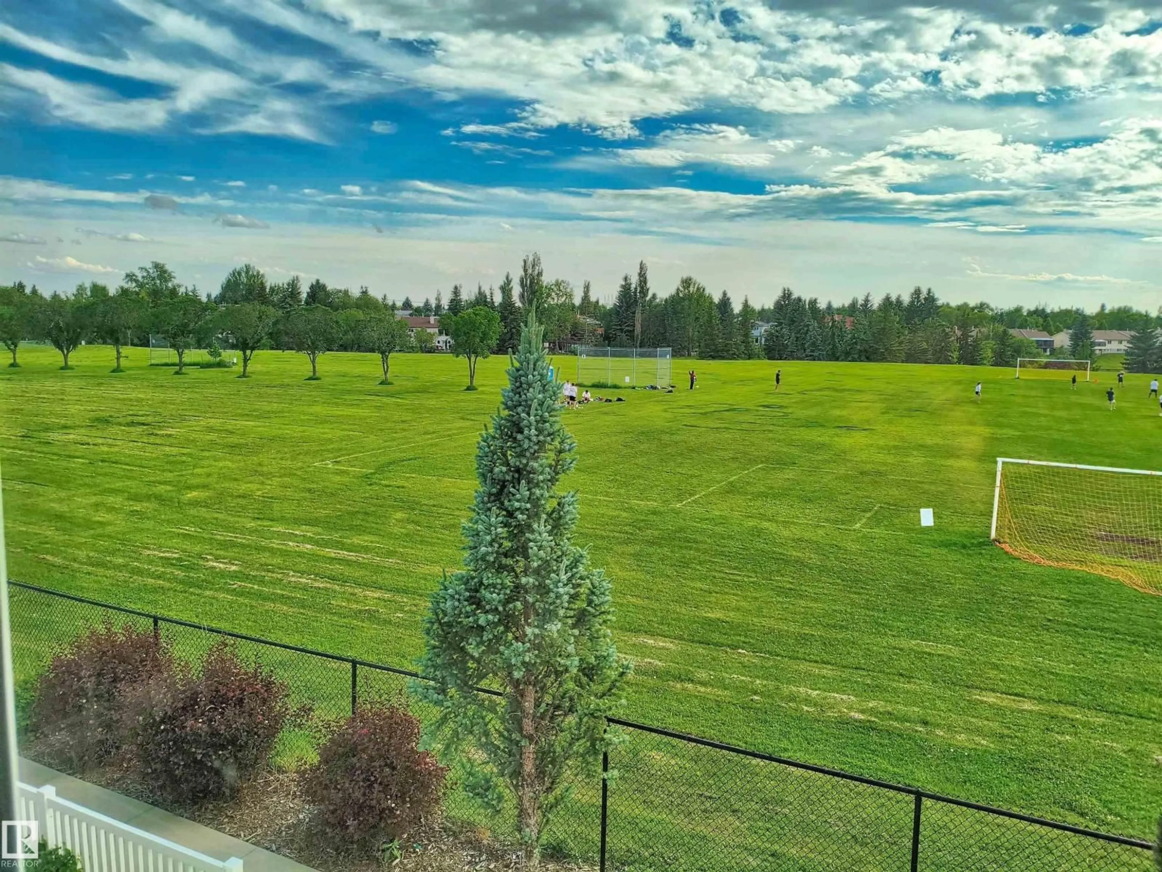 A pic from outside/outdoor area/front of a property/back of a property/a pic from drone, forest/trees view for 23 - 1508 105 ST NW, Edmonton Alberta T6J5R8
