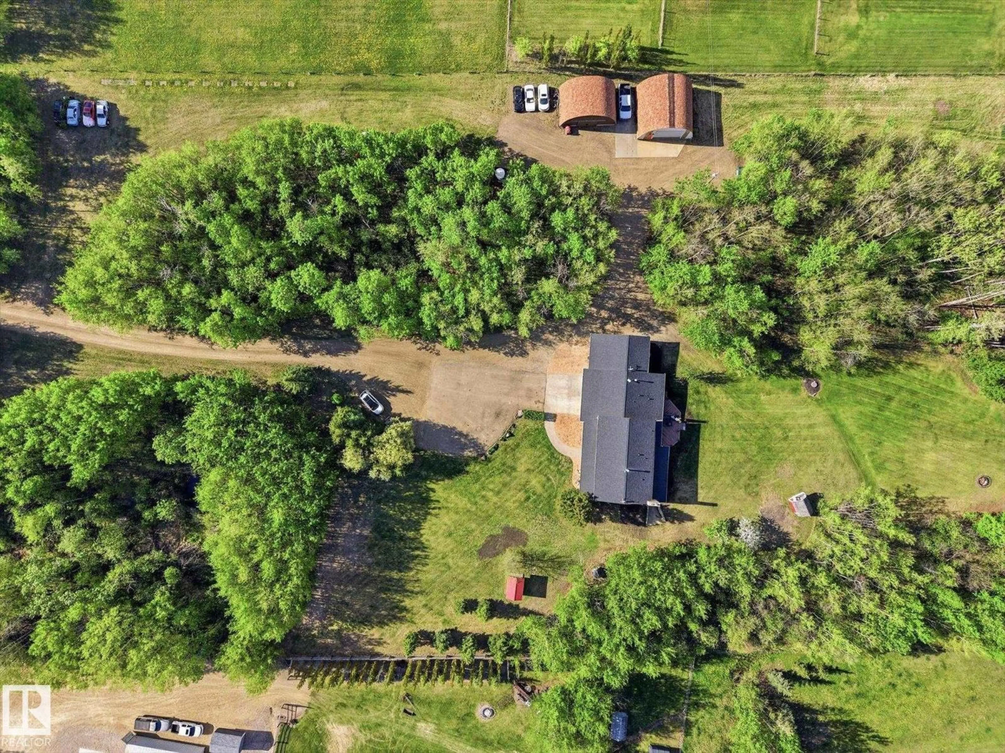 A pic from outside/outdoor area/front of a property/back of a property/a pic from drone, forest/trees view for 51408 RGE ROAD 224, Rural Strathcona County Alberta T8C1H5
