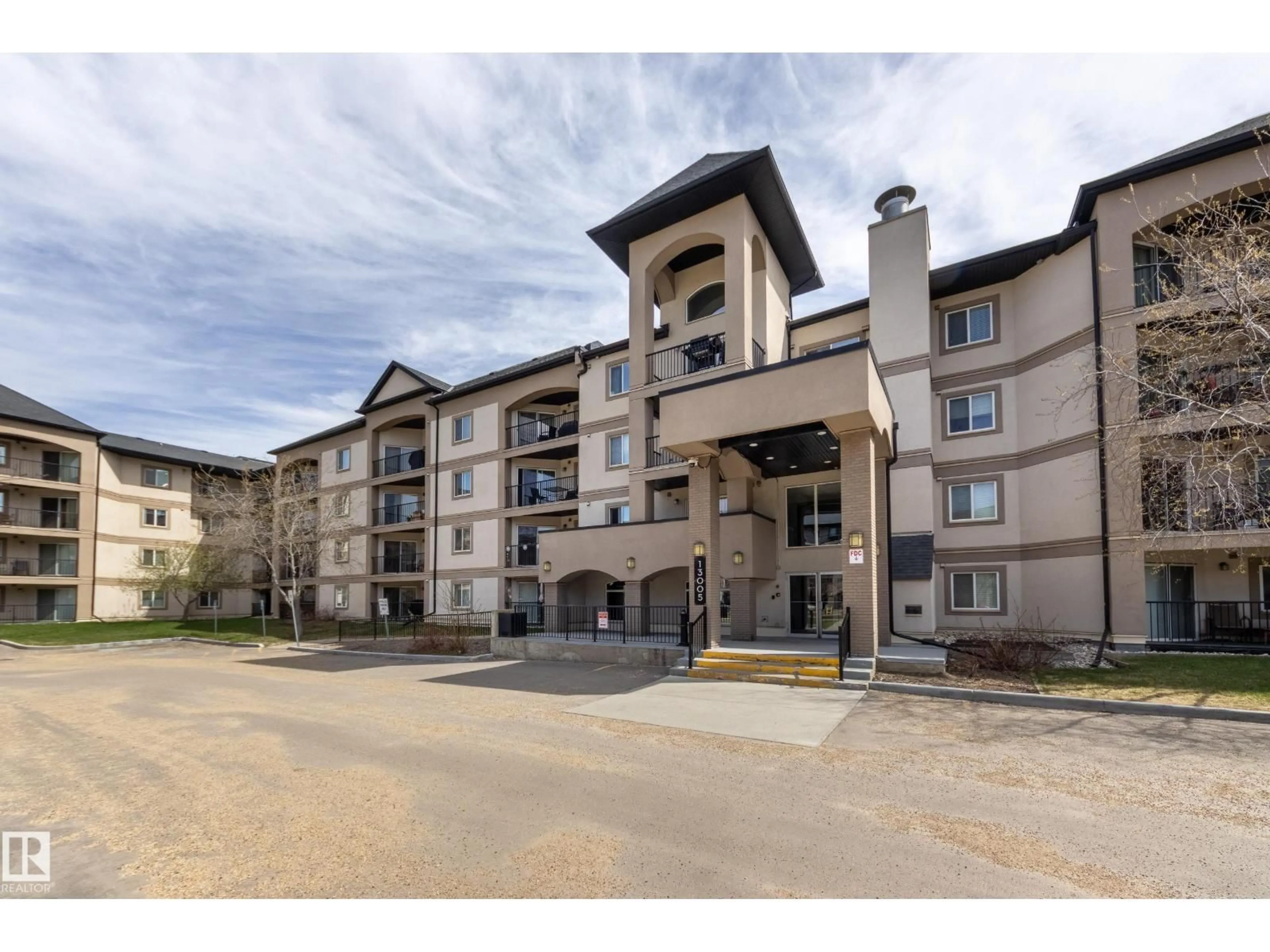 A pic from outside/outdoor area/front of a property/back of a property/a pic from drone, building for #307 - 13005 140 AV, Edmonton Alberta T6V1X1