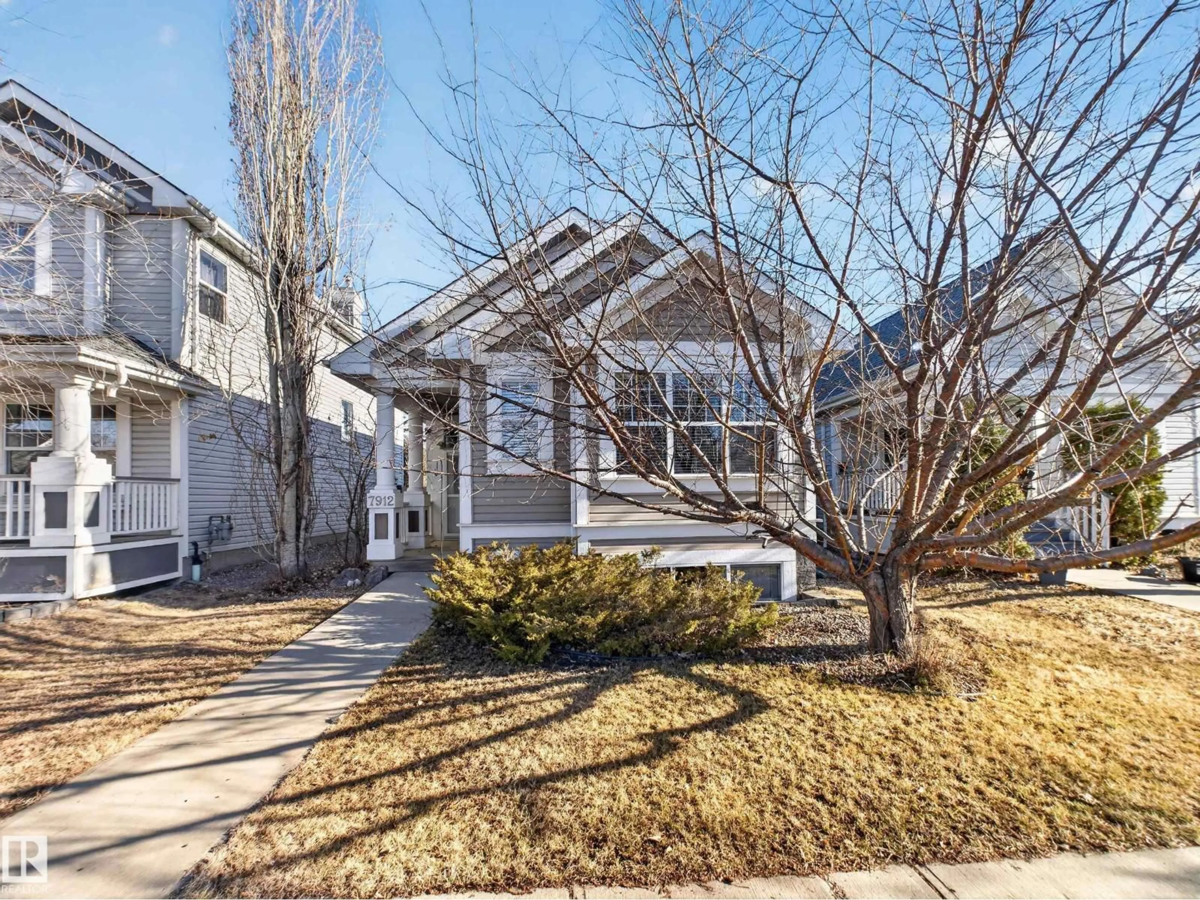 Home with vinyl exterior material, street for 7912 10 AV, Edmonton Alberta T6X1E7
