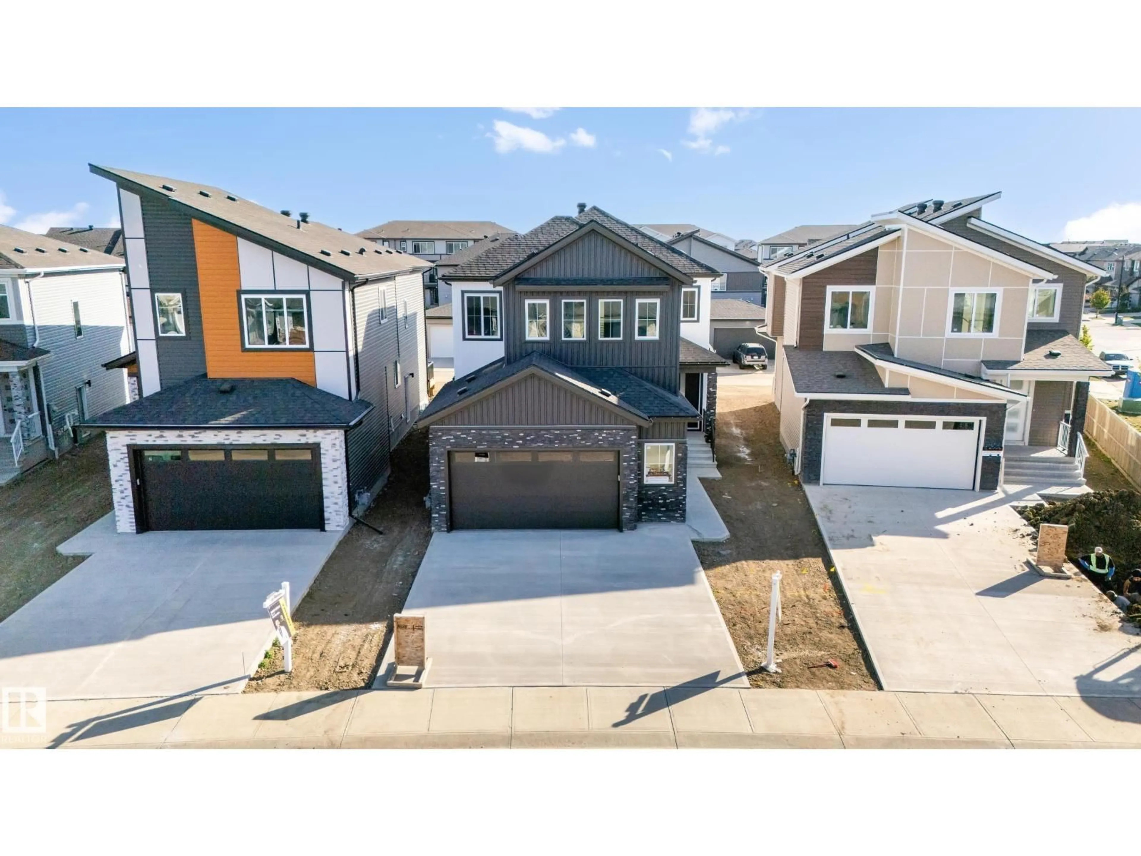 A pic from outside/outdoor area/front of a property/back of a property/a pic from drone, street for 119 LILAC CL, Leduc Alberta T9E1R3