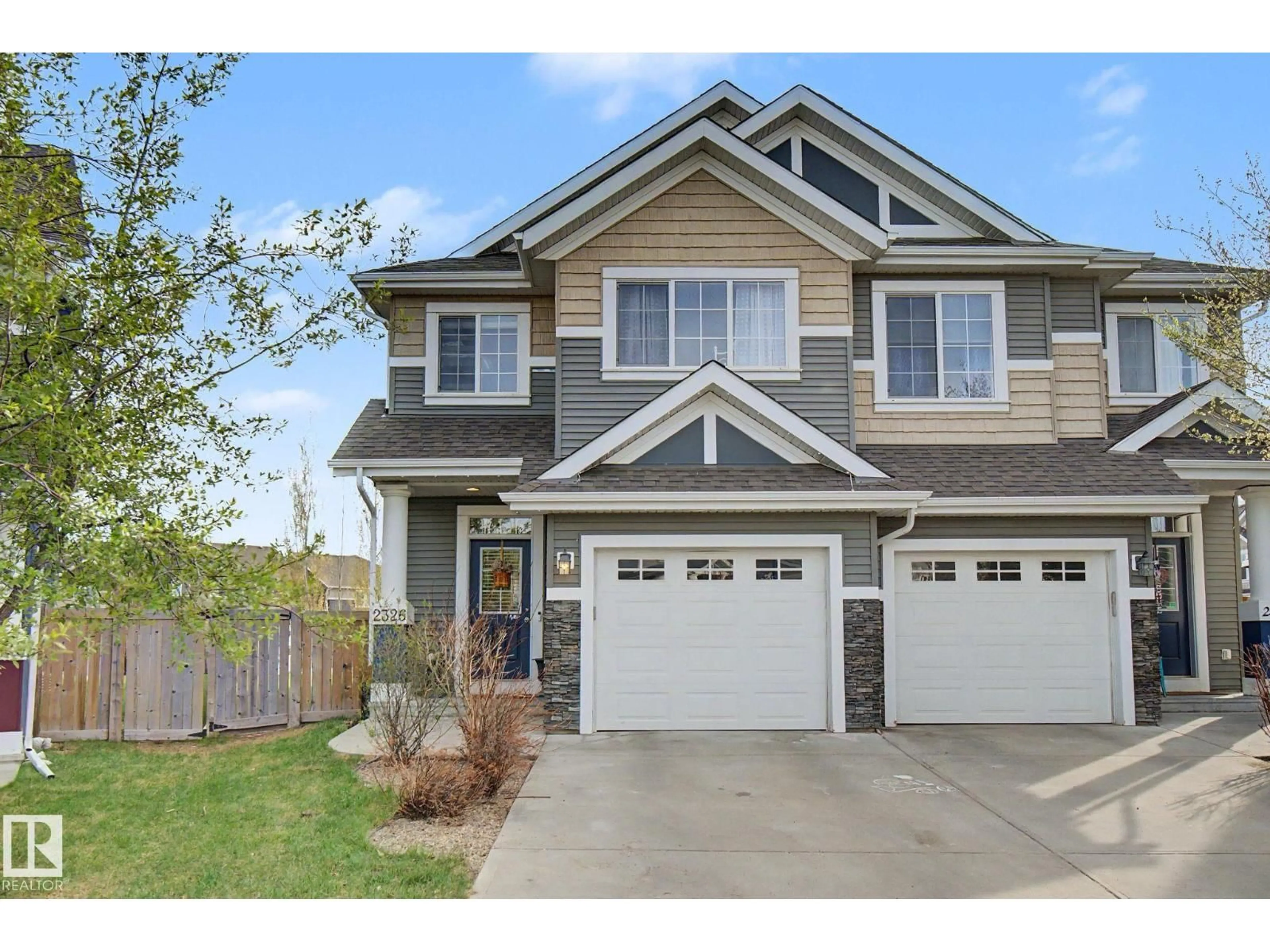 Home with vinyl exterior material, street for 2326 74 ST, Edmonton Alberta T6X0V5