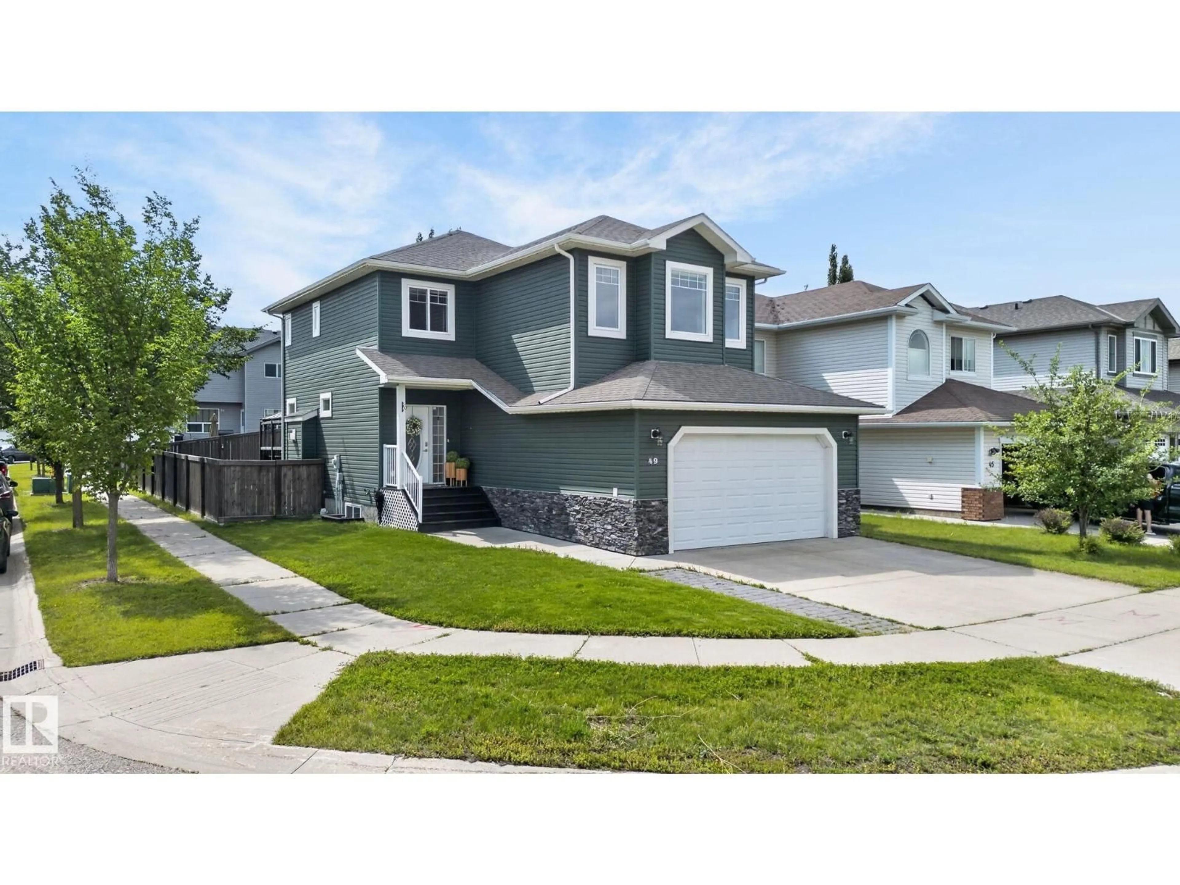 Home with vinyl exterior material, street for 49 ACADIAN WD, Fort Saskatchewan Alberta T8L0B7