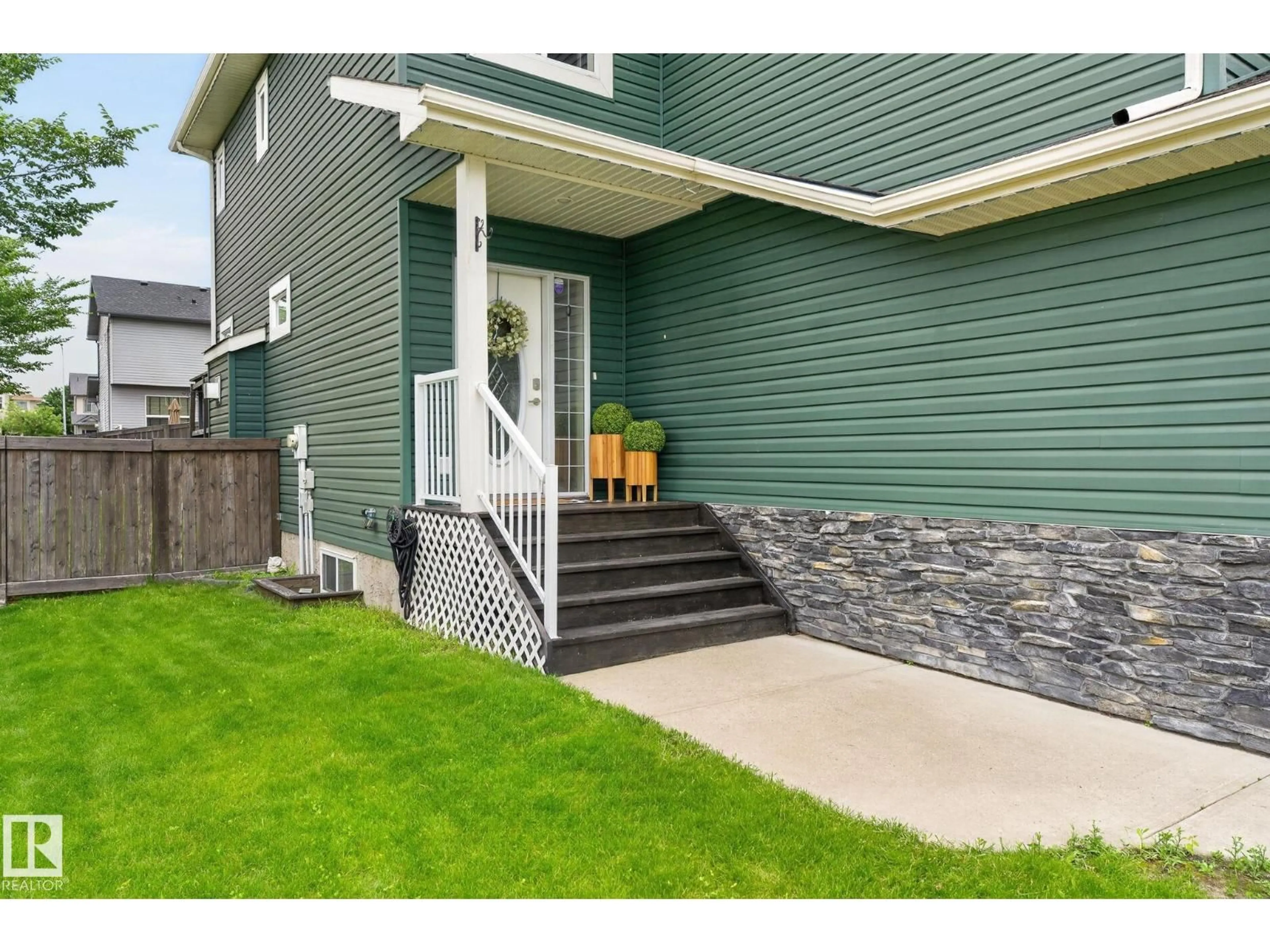 Home with vinyl exterior material, street for 49 ACADIAN WD, Fort Saskatchewan Alberta T8L0B7