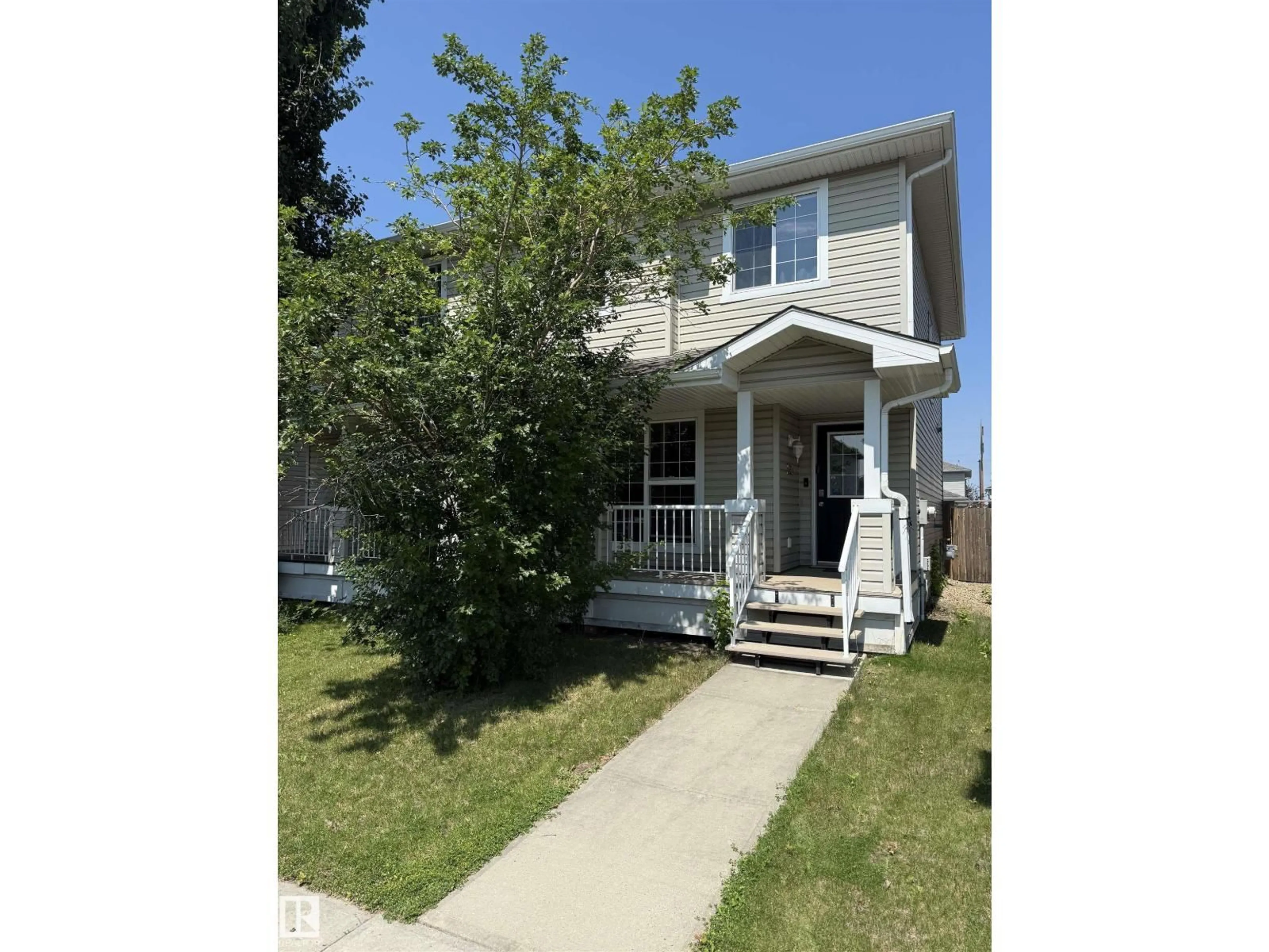 Home with vinyl exterior material, street for 2314 29A AV, Edmonton Alberta T6T2B2