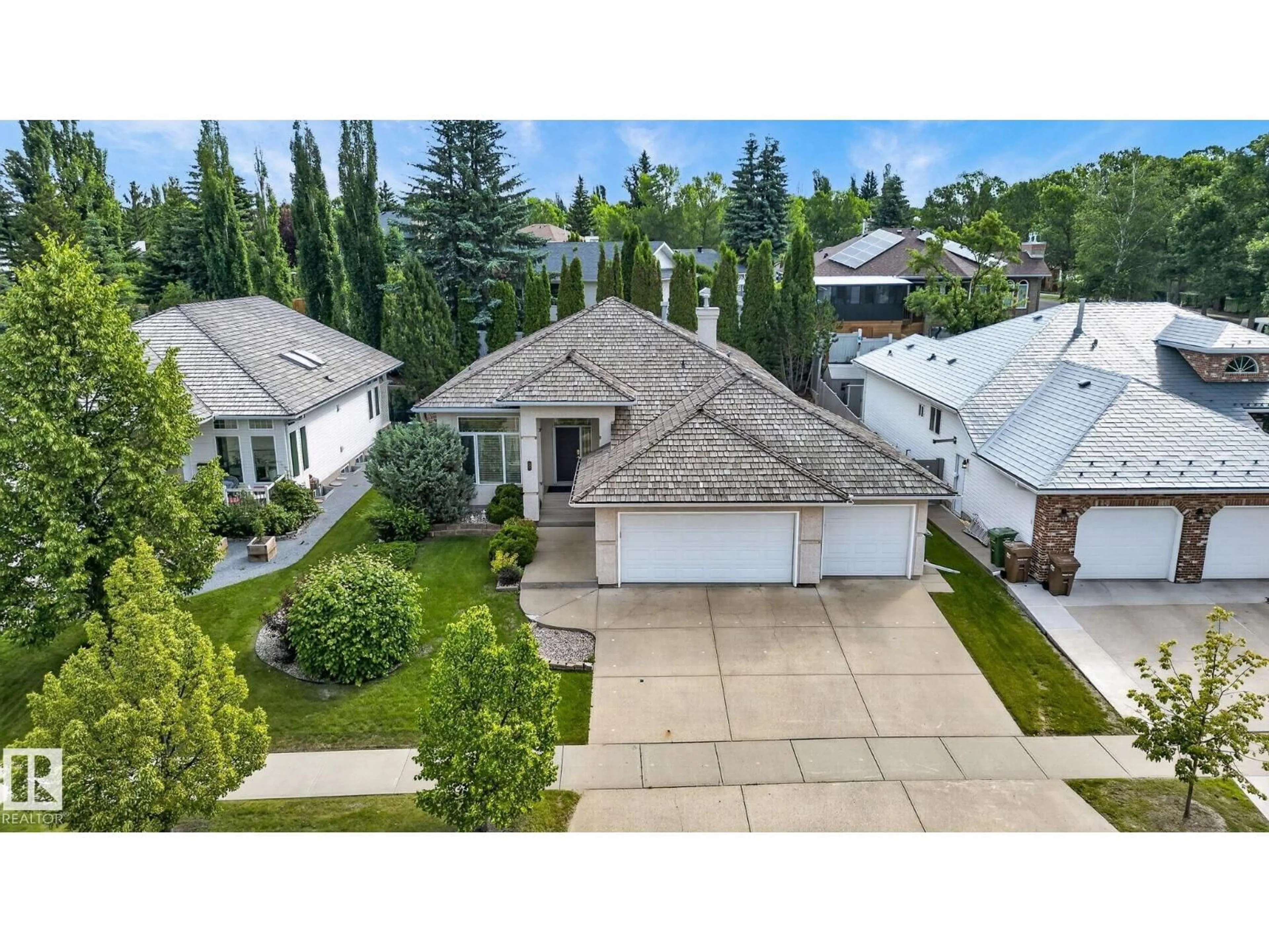 A pic from outside/outdoor area/front of a property/back of a property/a pic from drone, street for 2 KEATING PT, St. Albert Alberta T8N5W8
