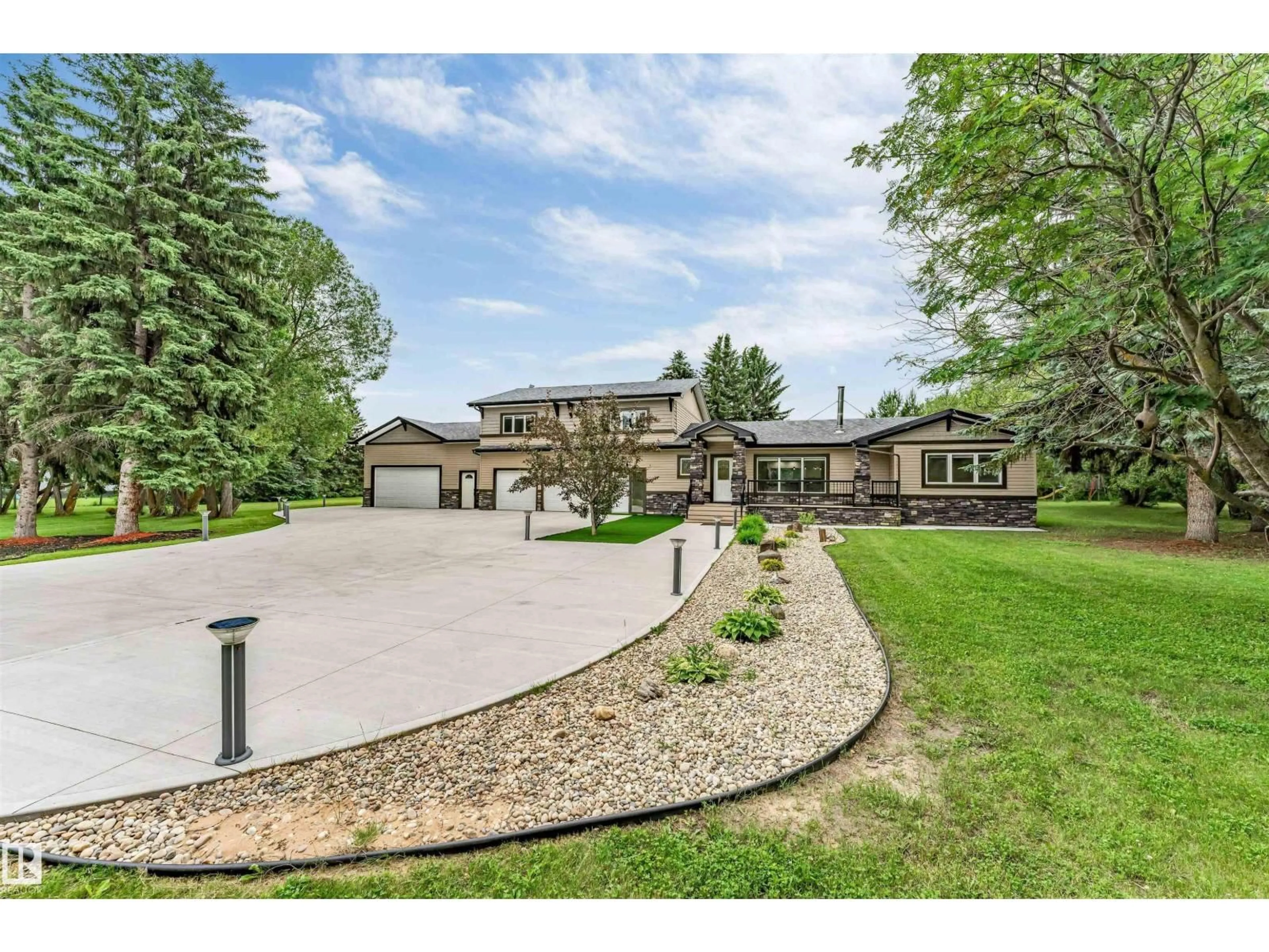 A pic from outside/outdoor area/front of a property/back of a property/a pic from drone, street for #37 - 51528 RGE ROAD 262, Rural Parkland County Alberta T6Y1C1