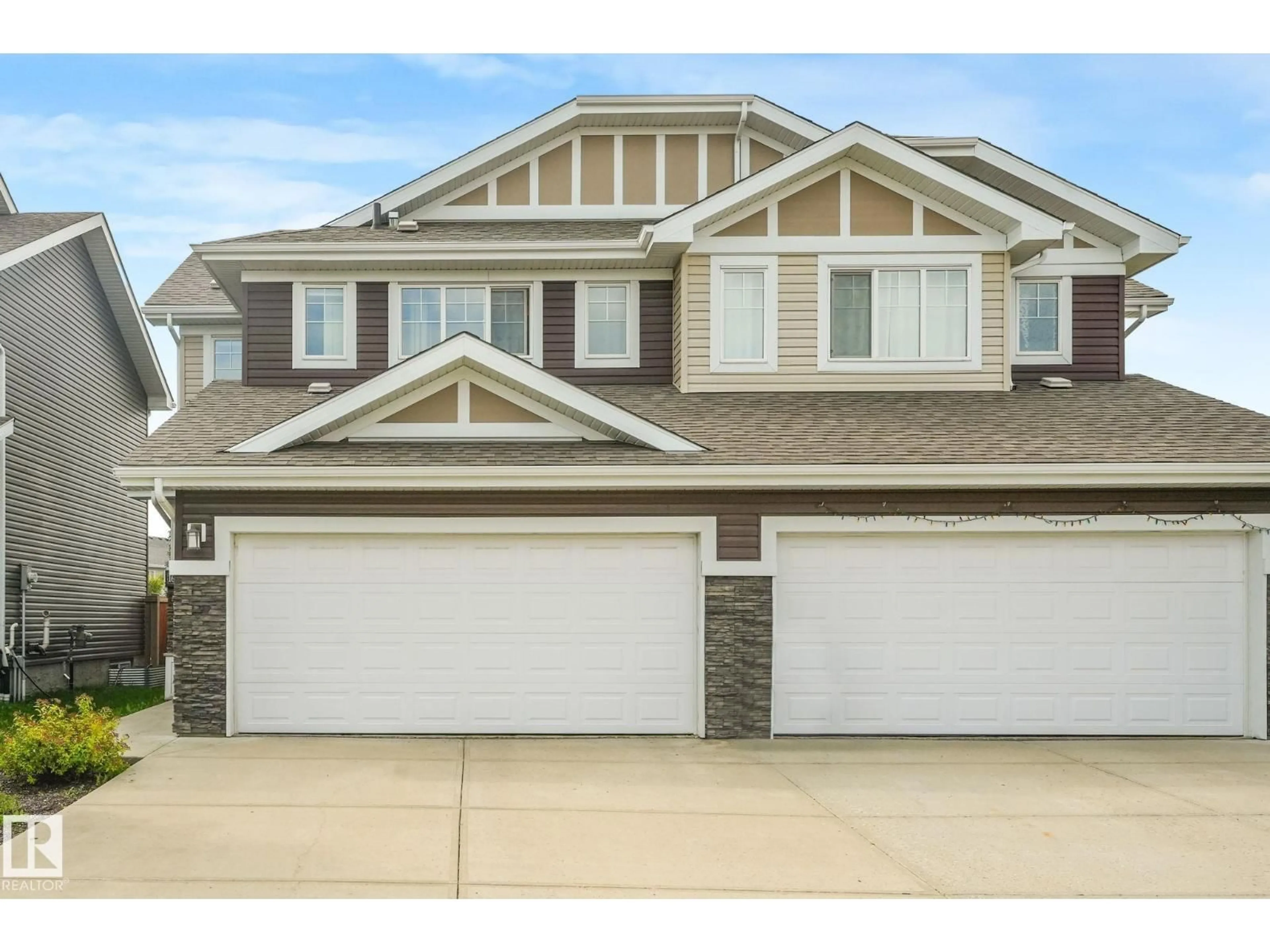 Home with vinyl exterior material, street for SW - 16619 14 AV, Edmonton Alberta T6W3C3